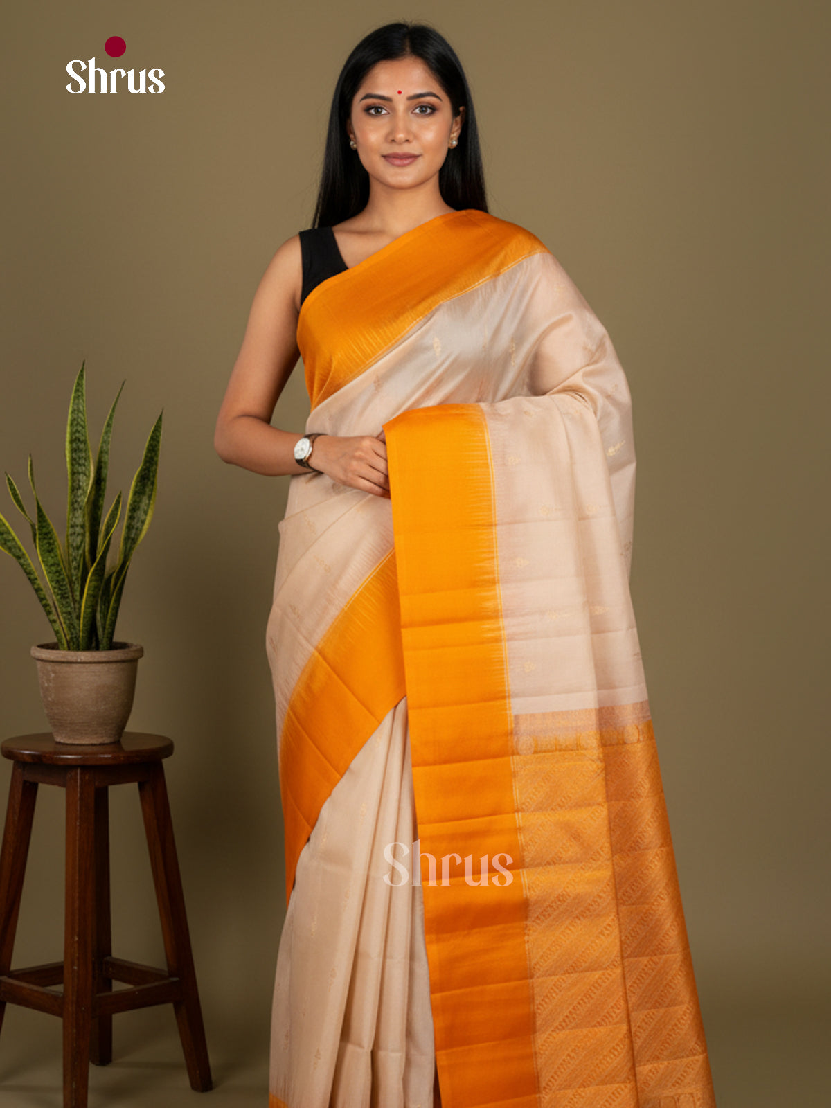 Buy Charming Cream Soft Silk Sarees with Gold Floral Buttas, Mustard Border & Brocade Pallu