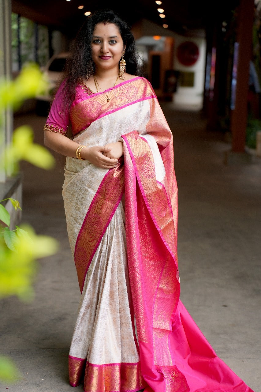Cream & Pink- Semi Kanchipuram Saree with checkered Rudraksha & Peacock body patterns & with Gold zari borders - Shop on ShrusEternity.com