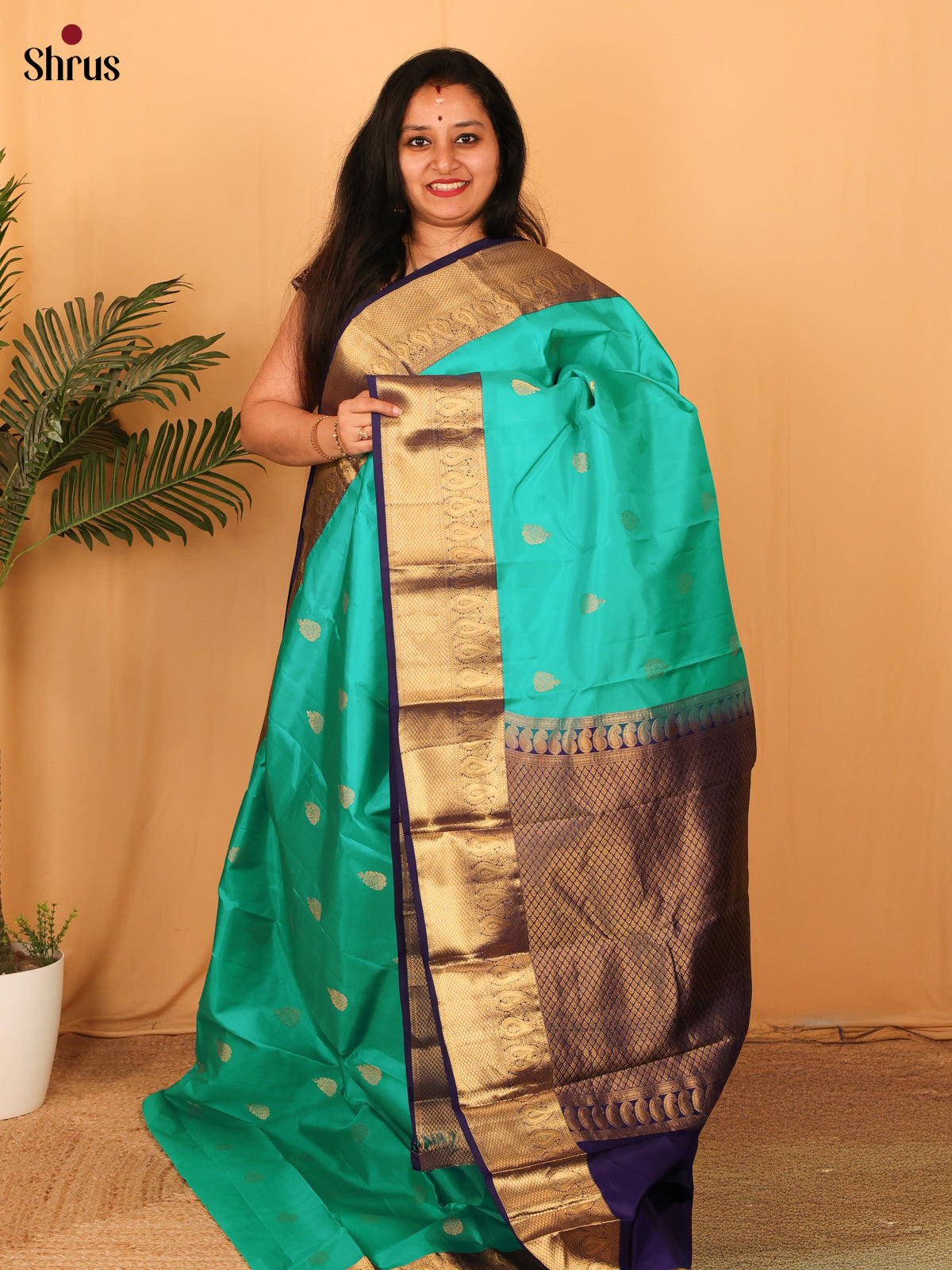 Enchanting Teal and Violet Kanchipuram Silk Saree with Beautiful Zari Buttas-1
