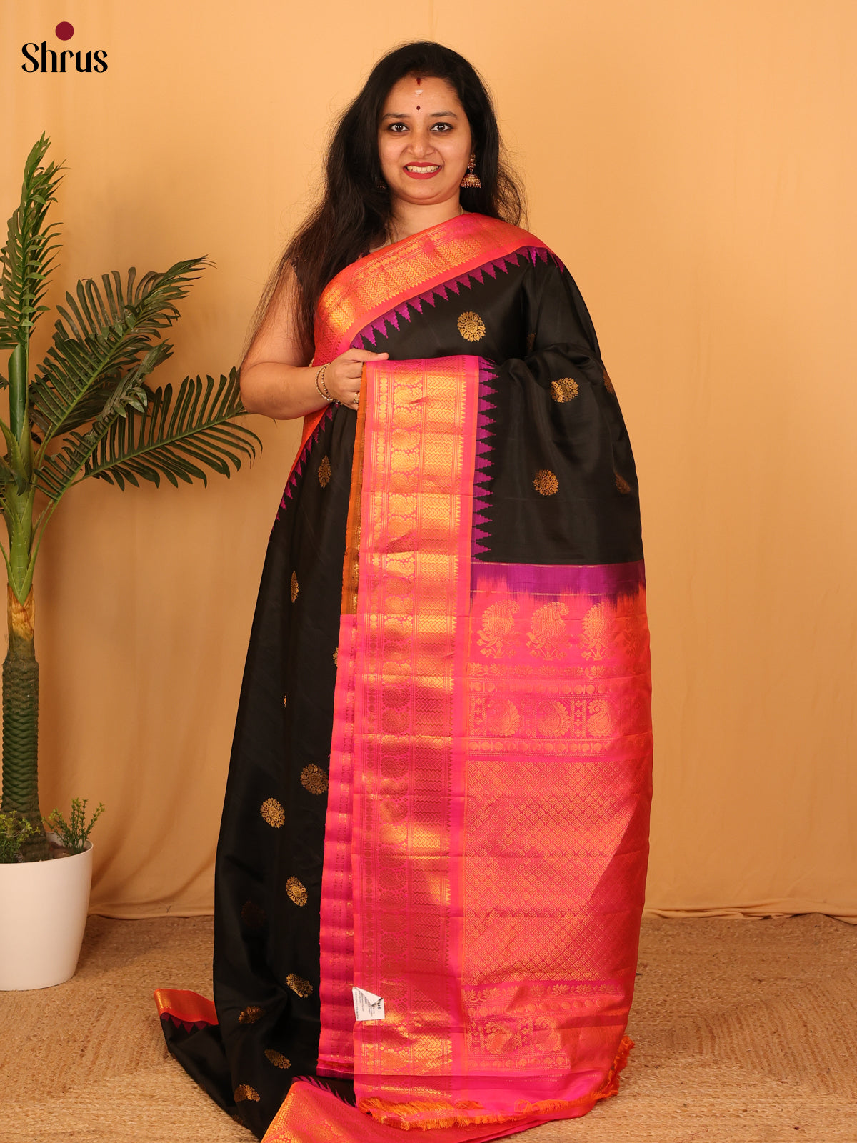 Striking Black and Pink Gadwal Silk Saree with Intricately Woven Zari Border