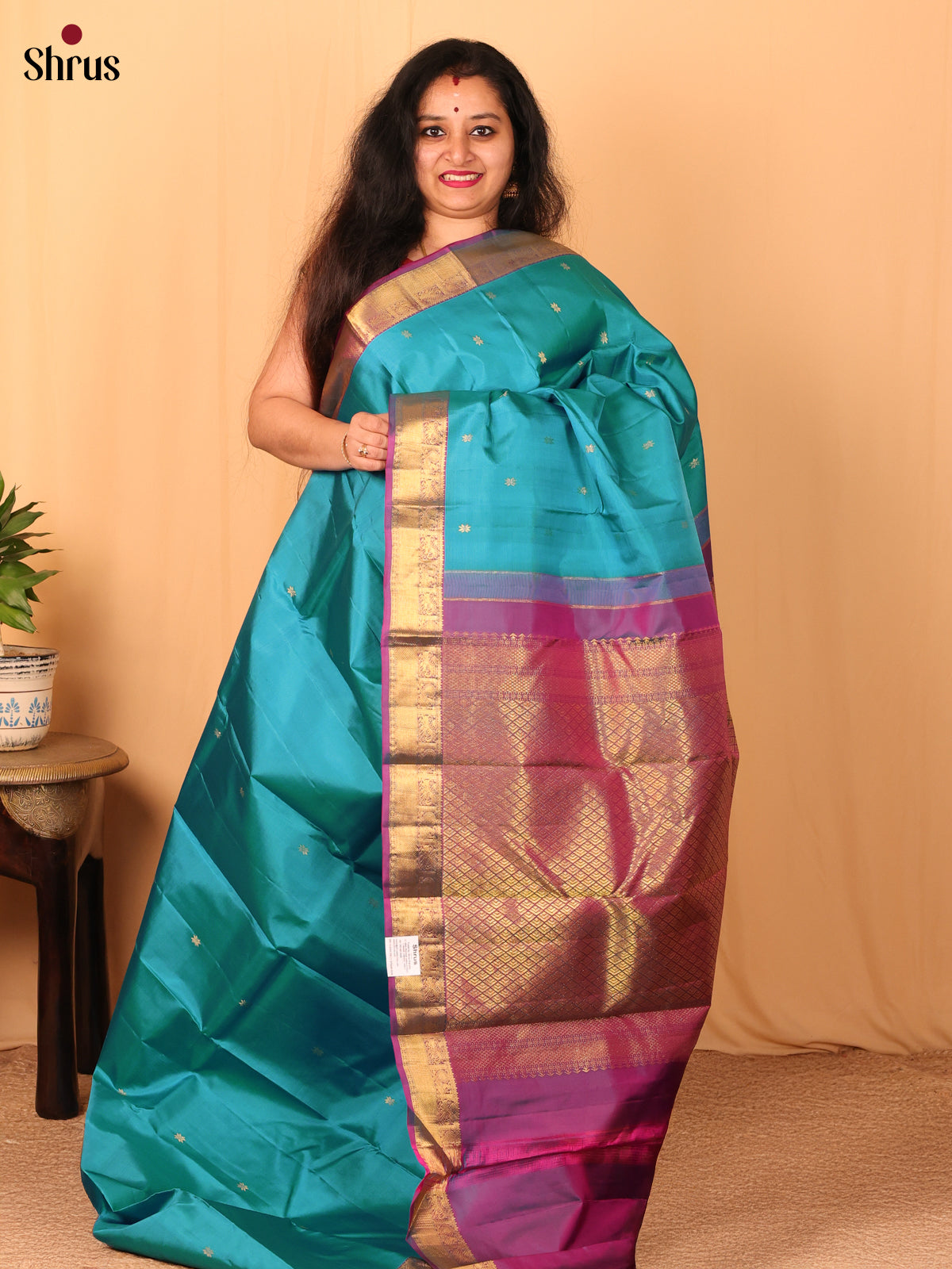 Teal Blue and Purple Kanchipuram silk Saree With Pure Zari Woven Floral Buttas - Shop on Shrus.com