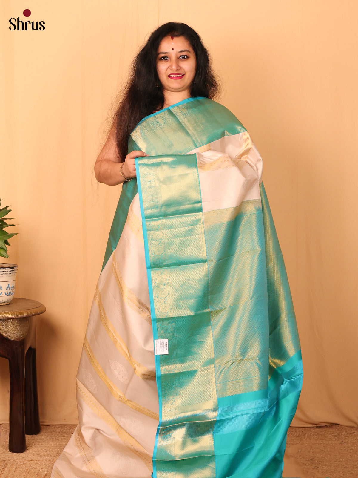Cream and Teal Pure Kanchipuram silk Saree With Zari Stripes and Floral Buttas-1