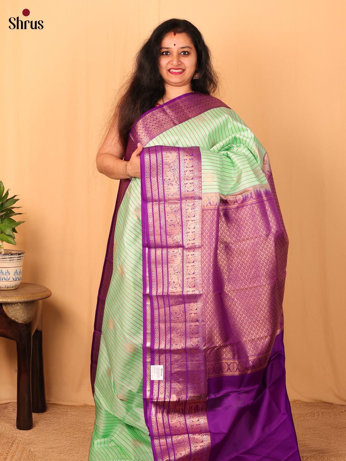 Pista Green and Purple Pure Kanchipuram silk Saree With Thread Woven Stripes and Zari Buttas - Shop on Shrus.com
