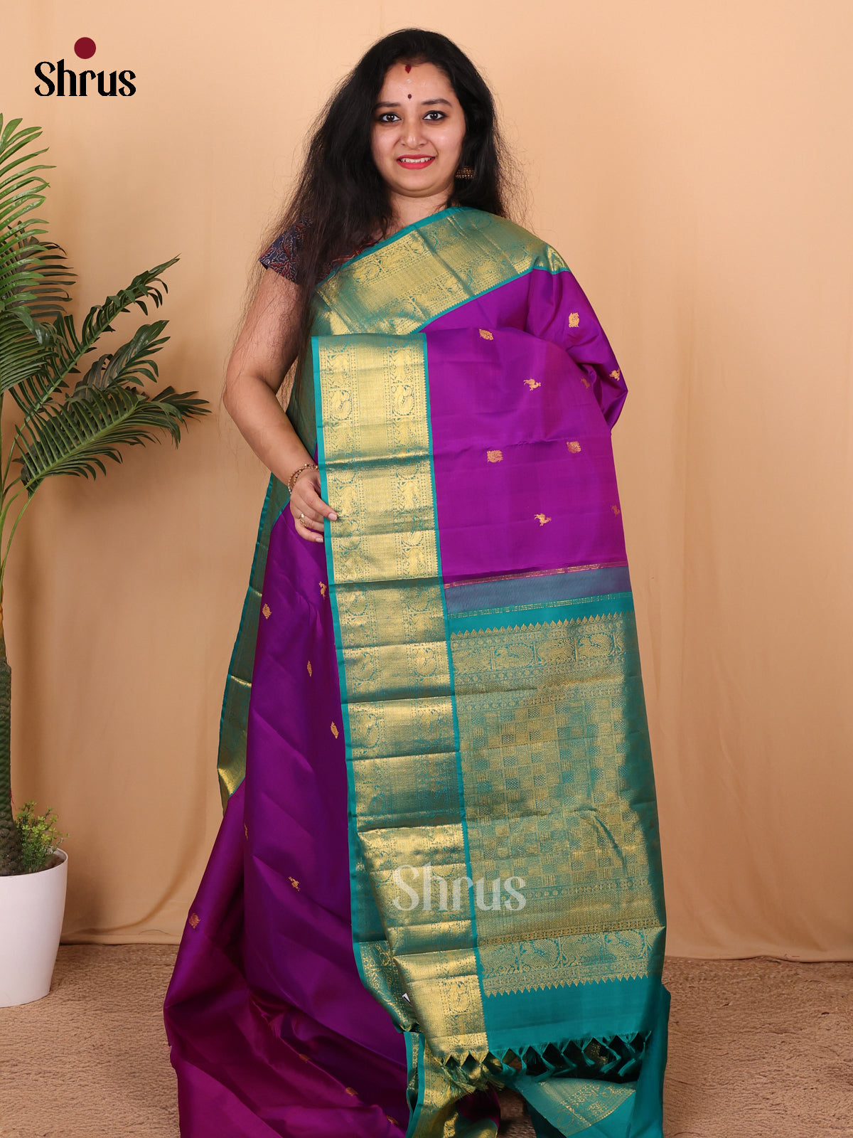 Vibrant Purple and Teal Pure Kanchipuram silk Saree Featuring Golden Zari Woven Buttas-1