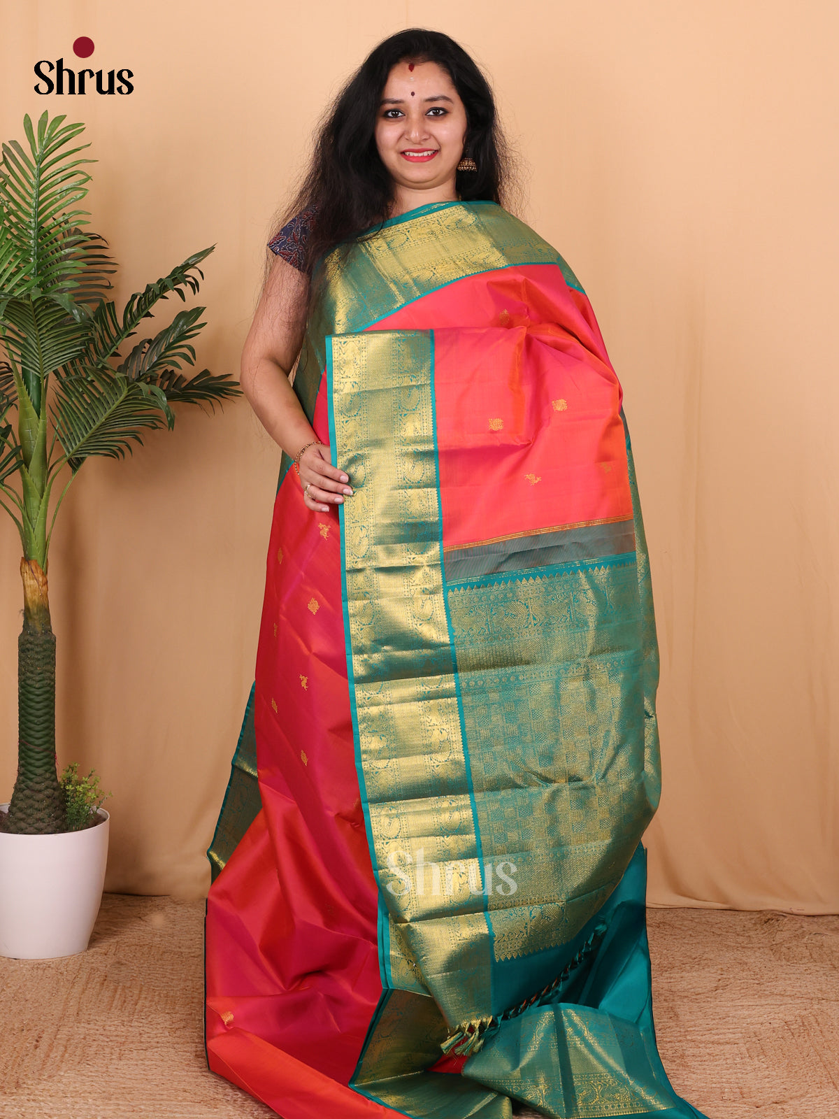 Bold Red and Green Bridal Kanchipuram silk Saree Crafted With Intricate Zari Buttas-1