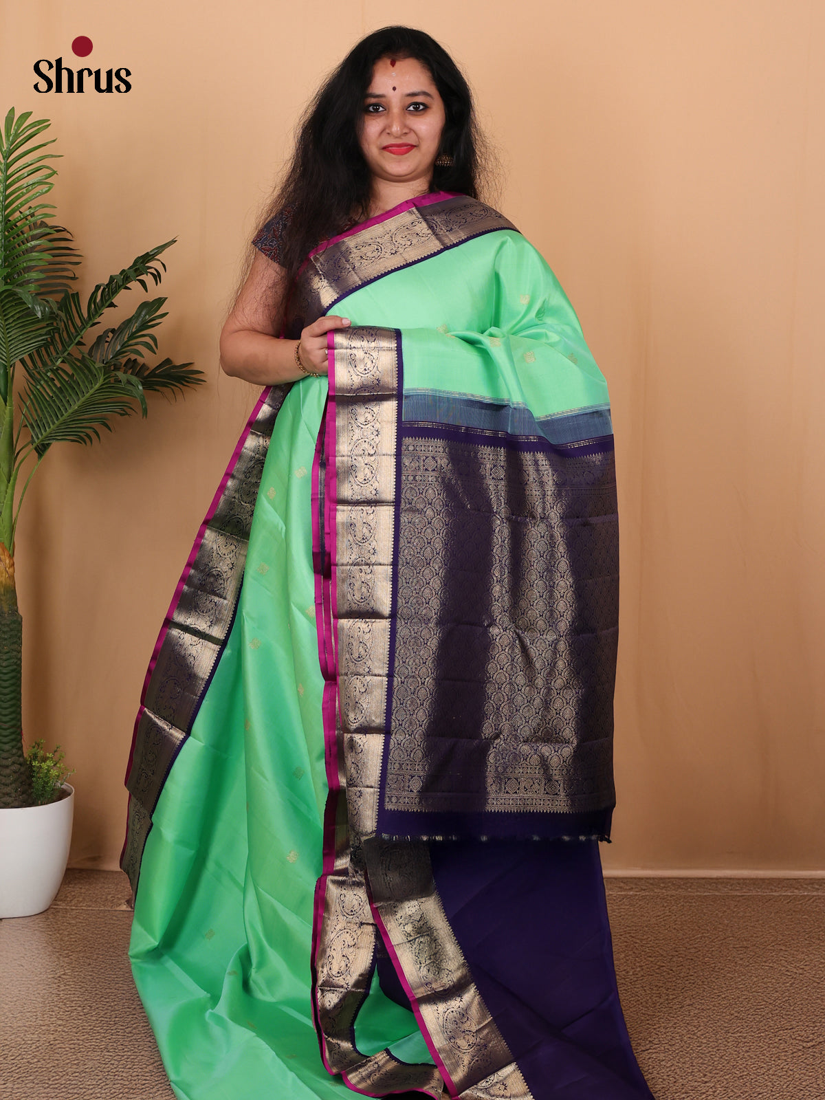 Pastel Green and Blue Pure Kanchipuram silk Saree Featuring Zari Woven Buttas-1