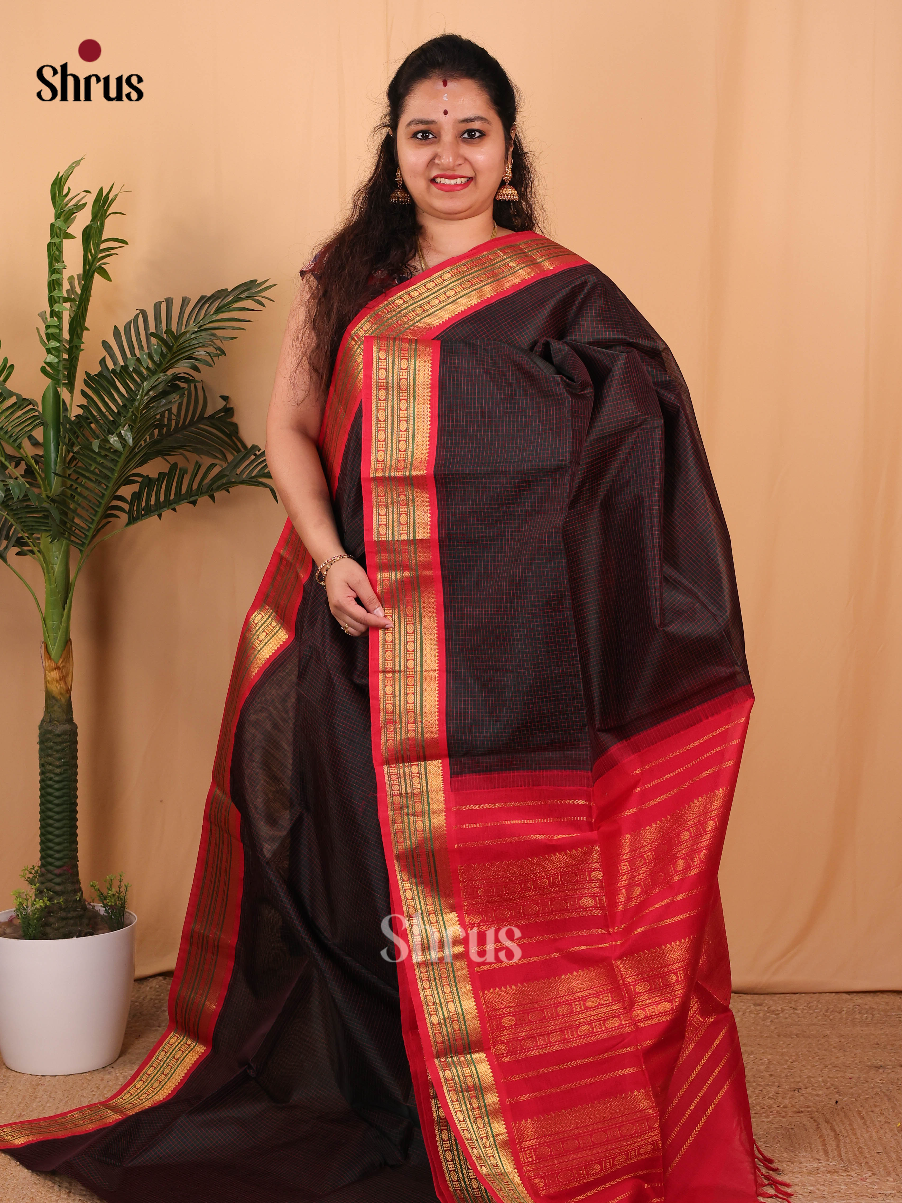 Majestic Black Silk Cotton Saree With Thread Woven Checks Across The Body And Contrast Red Zari Woven Border - Shop on Shrus.com
