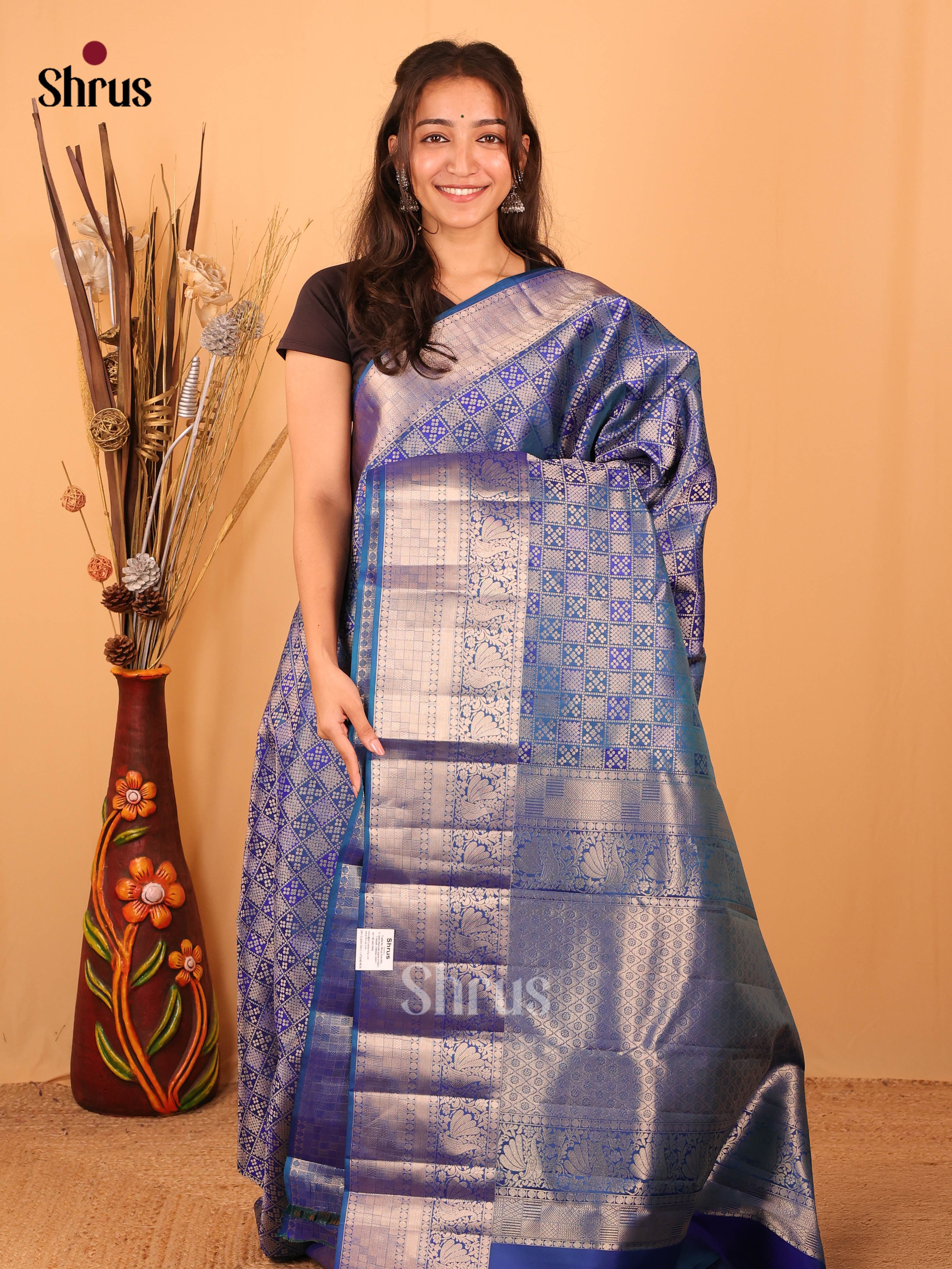 Blue Kanchipuram silk Saree With Zari Woven Floral Brocade Design - Shop on Shrus.com