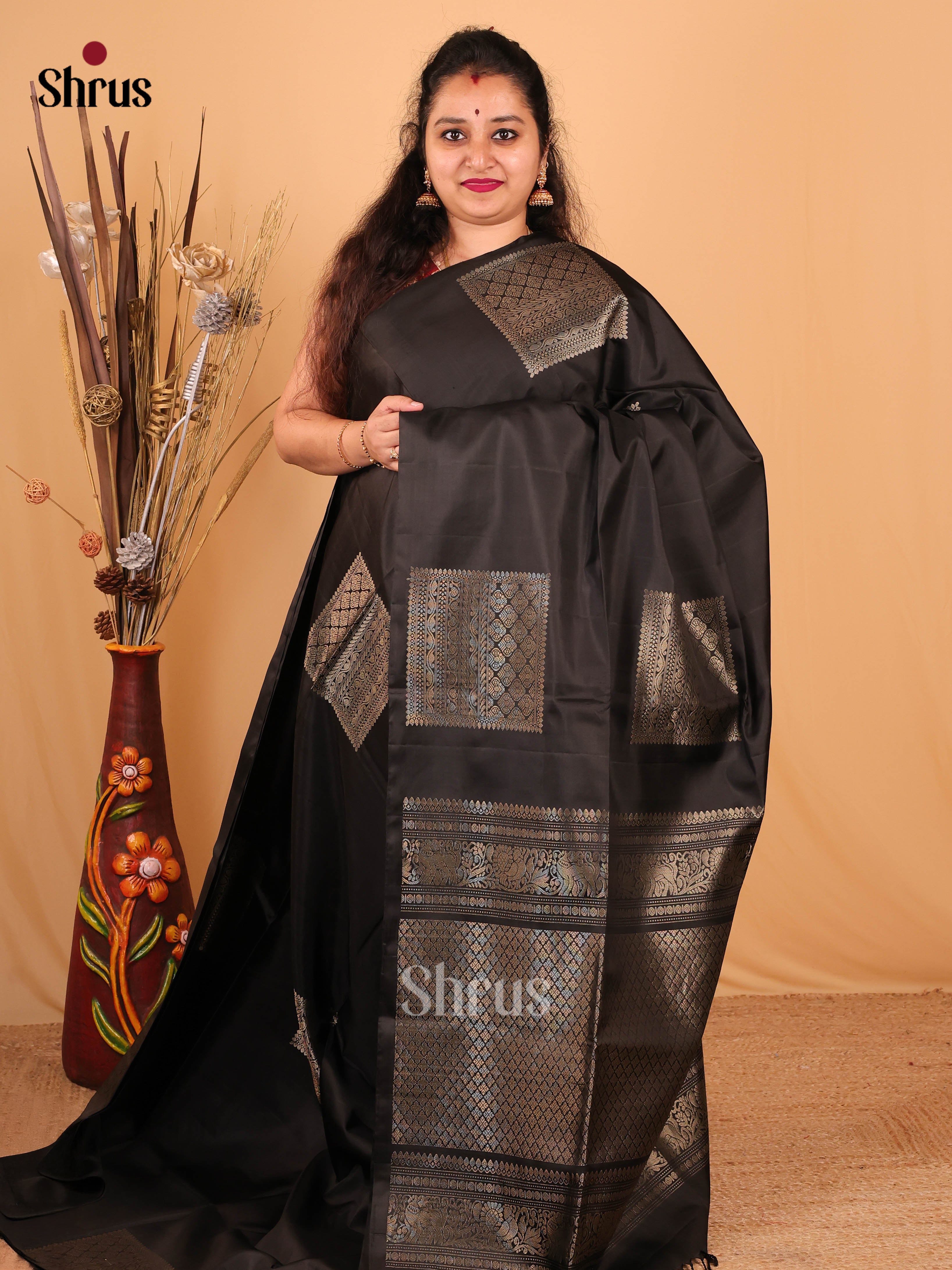 Gleaming Black Soft Silk Saree With Golden Floral Blocks Motifs & Brocade Pallu-1