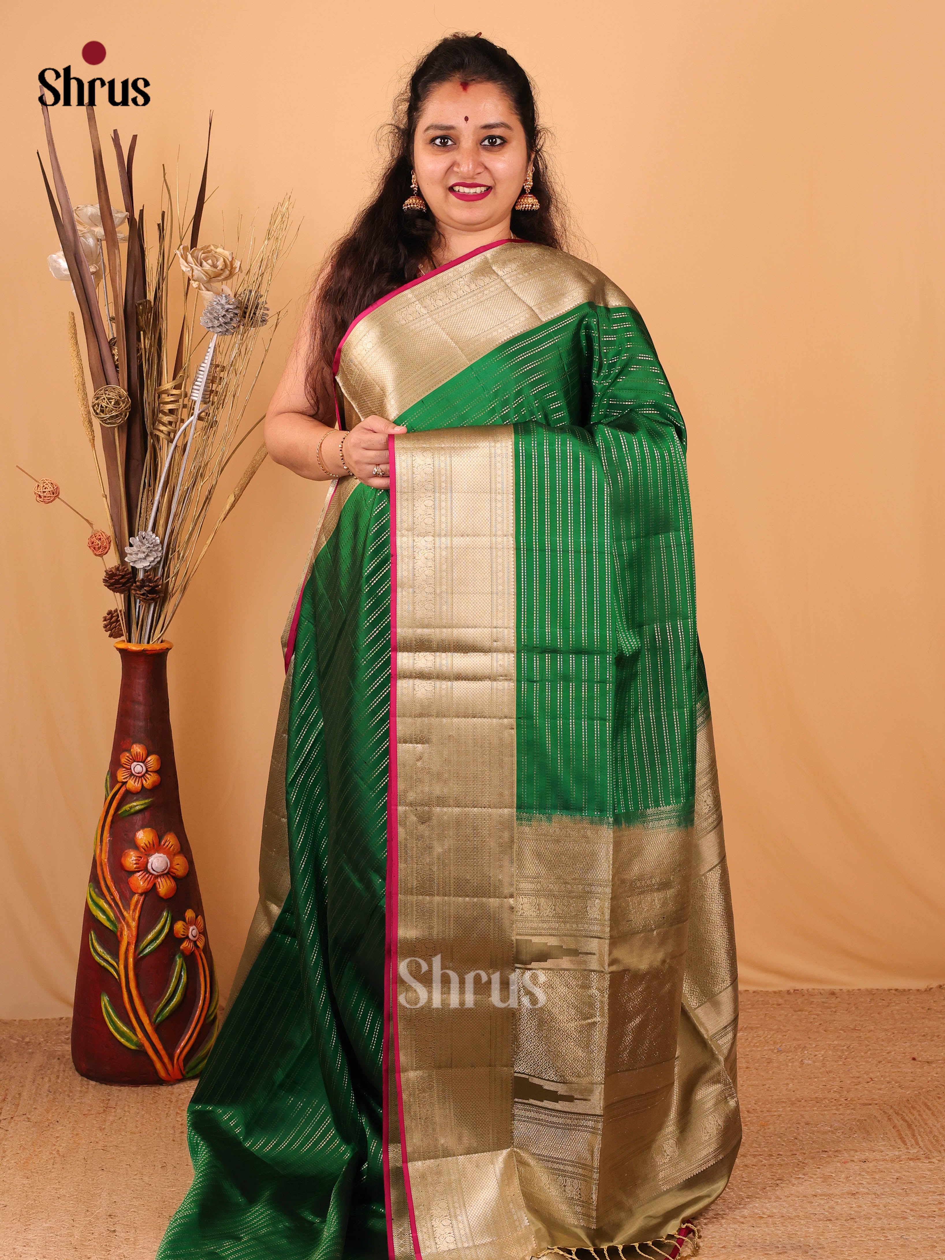 Chic Green Soft Silk Saree With Zari Stripes, Elaichi Green Border & Brocade Pallu-1