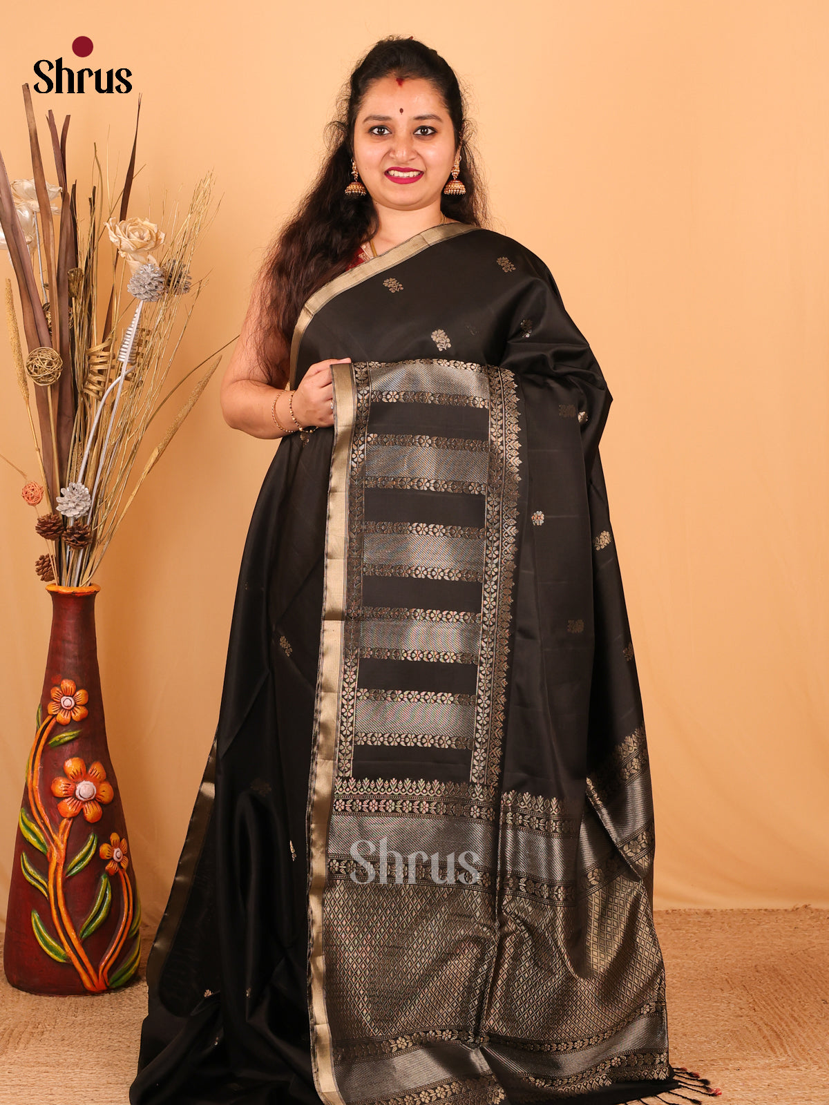 Beautiful Black Soft Silk Saree with Floral Zari Buttas & Brocade Pallu-1