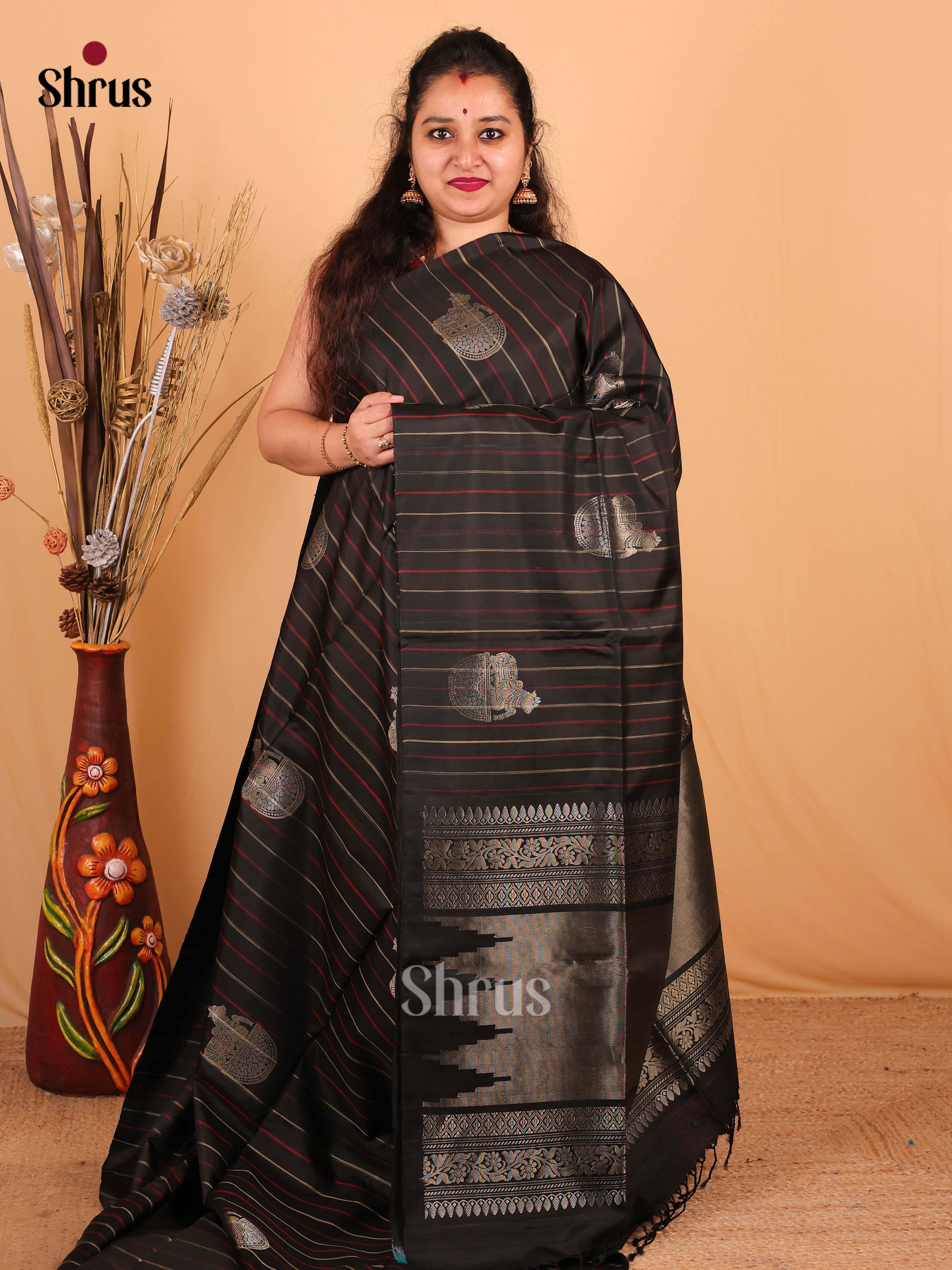 Dazzling Black Borderless Silk Saree with Gold & Silver Zari Woven Cow Motifs-1