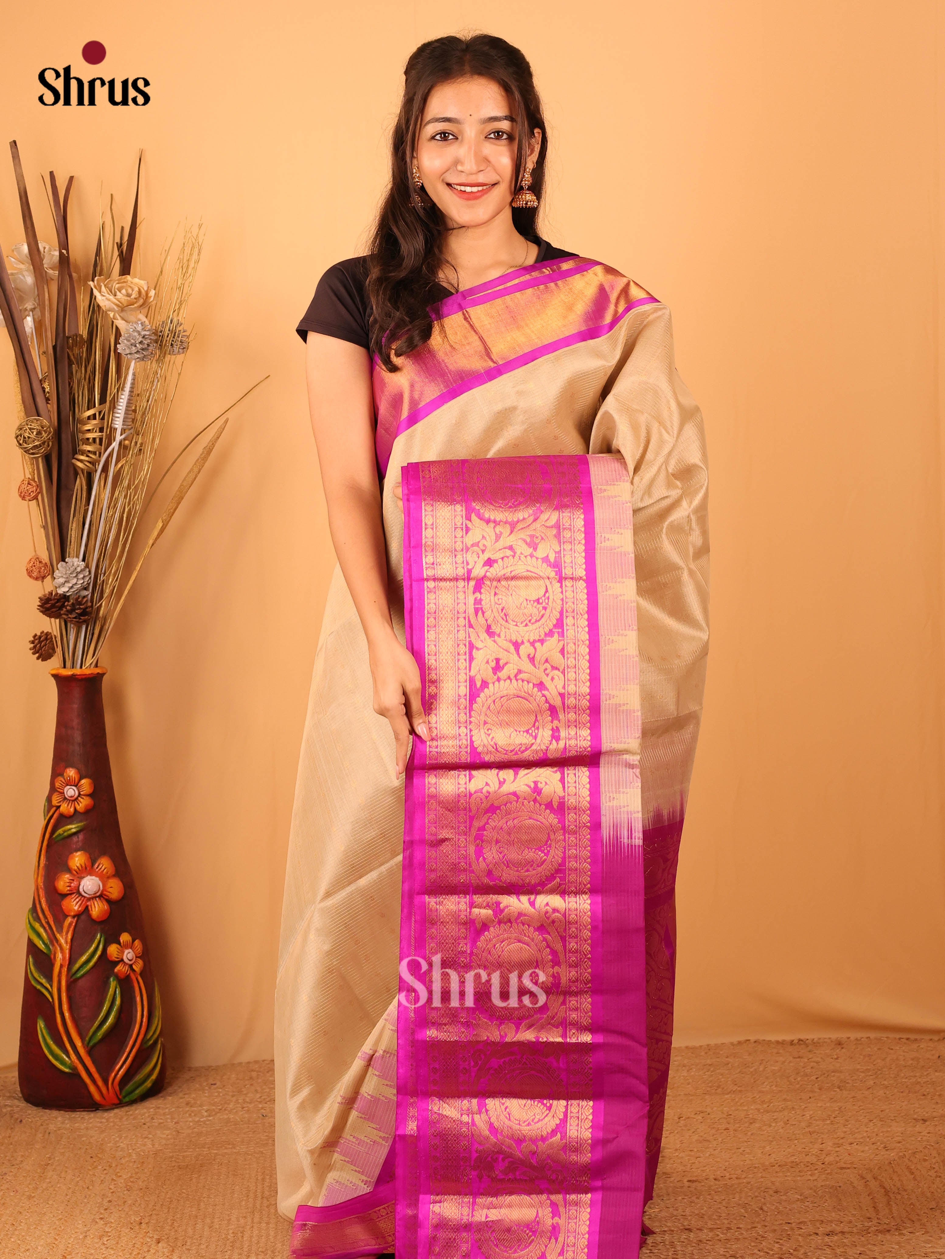 Enchanting Cream Silk Cotton Saree With Zari Woven Stripes Across The Body And Contrast Pink Border With Peacock Motifs - Shop on Shrus.com