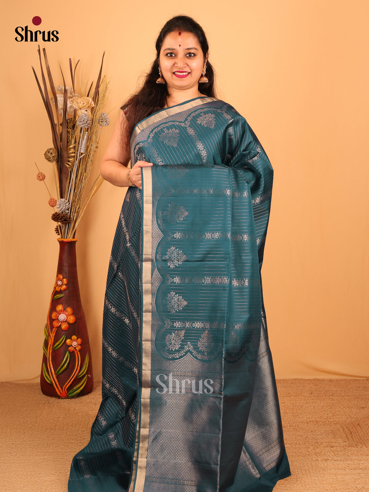 Classic Peacock Green Soft Silk Saree With Zari Stripe & Vine Across The Body And Floral Zari Border-1