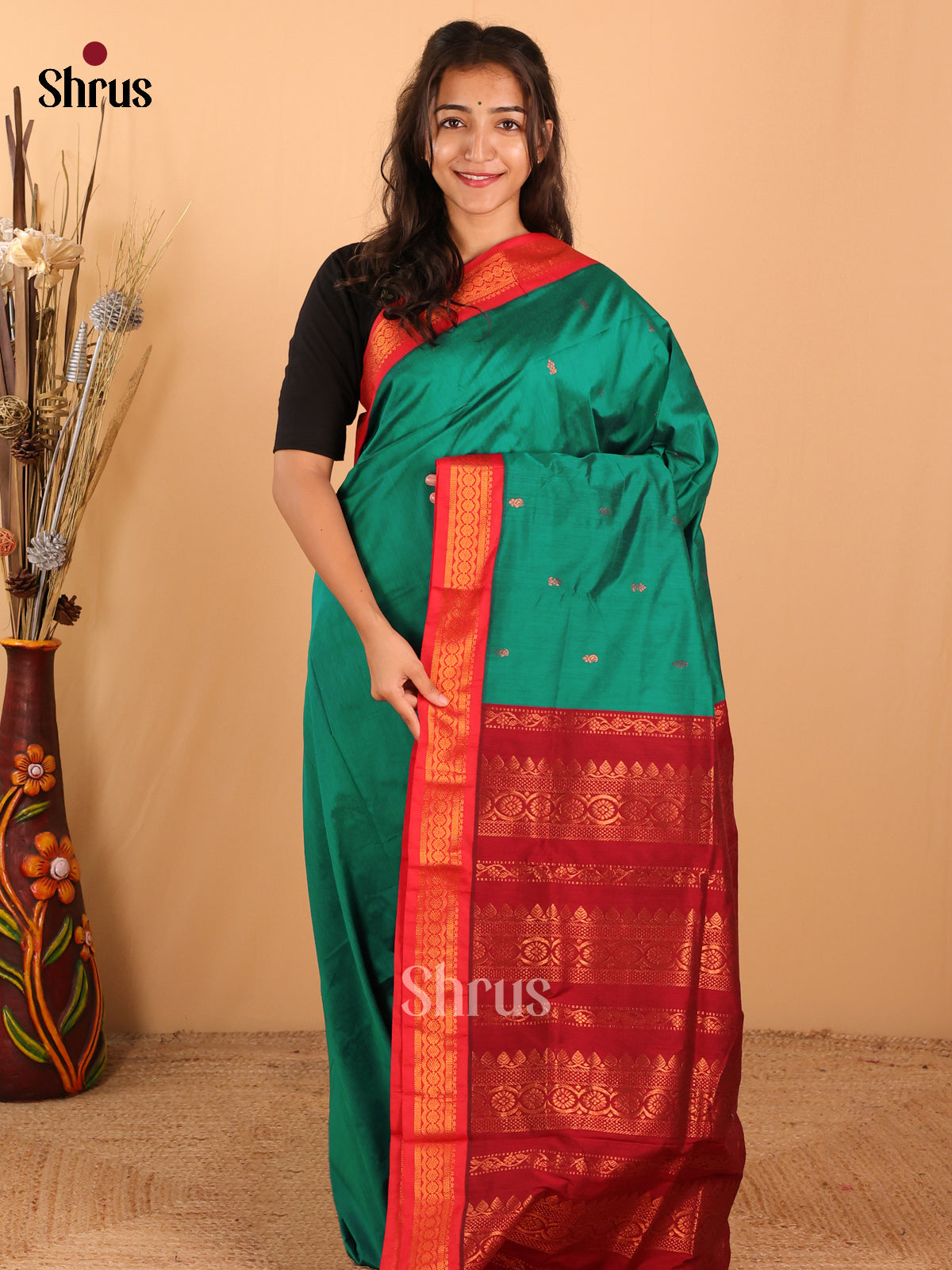 Peacock Green Kalyani Cotton with Gleaming Copper Zari Buttas & Maroon Temple Border & Pallu. - Shop on Shrus.com