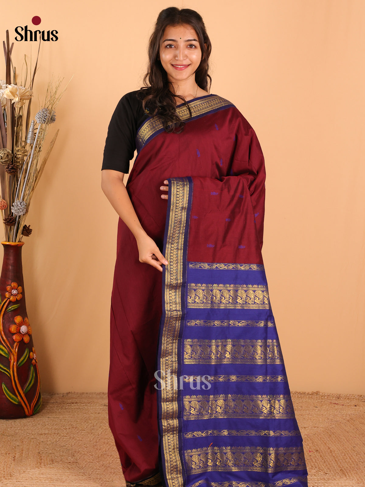 Rich Maroon Kalyani Cotton, paired with a Royal Blue contrast border & pallu With Zari - Shop on Shrus.com