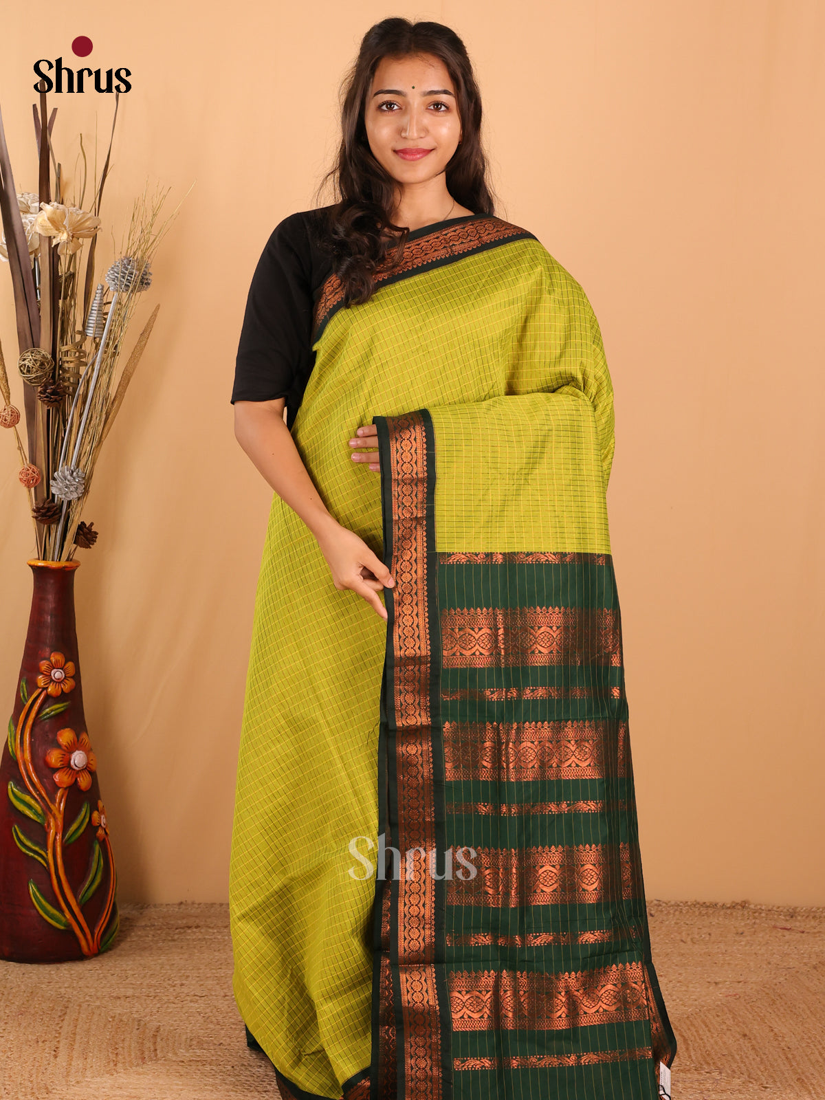 Green Kalyani Cotton Saree with Zari Border and Putta