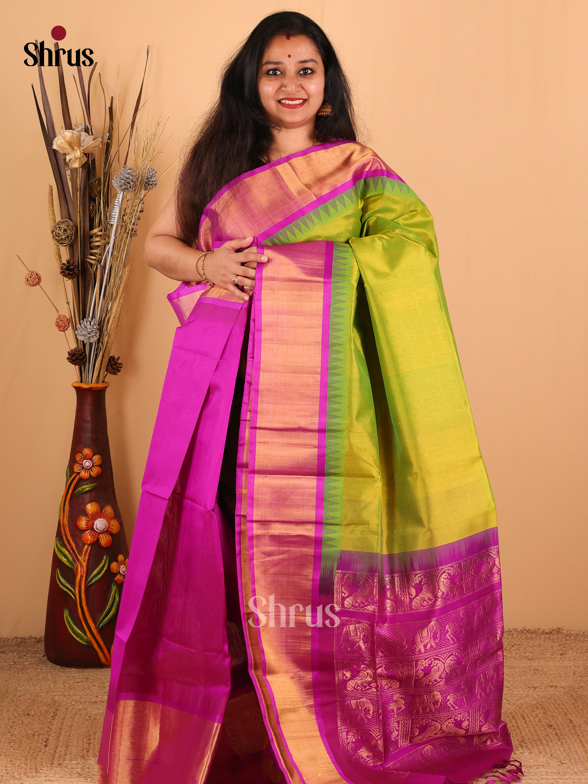 Captivating Green And Purple Silk Cotton Saree With Plain Body And Zari Woven Temple Border - Shop on Shrus.com