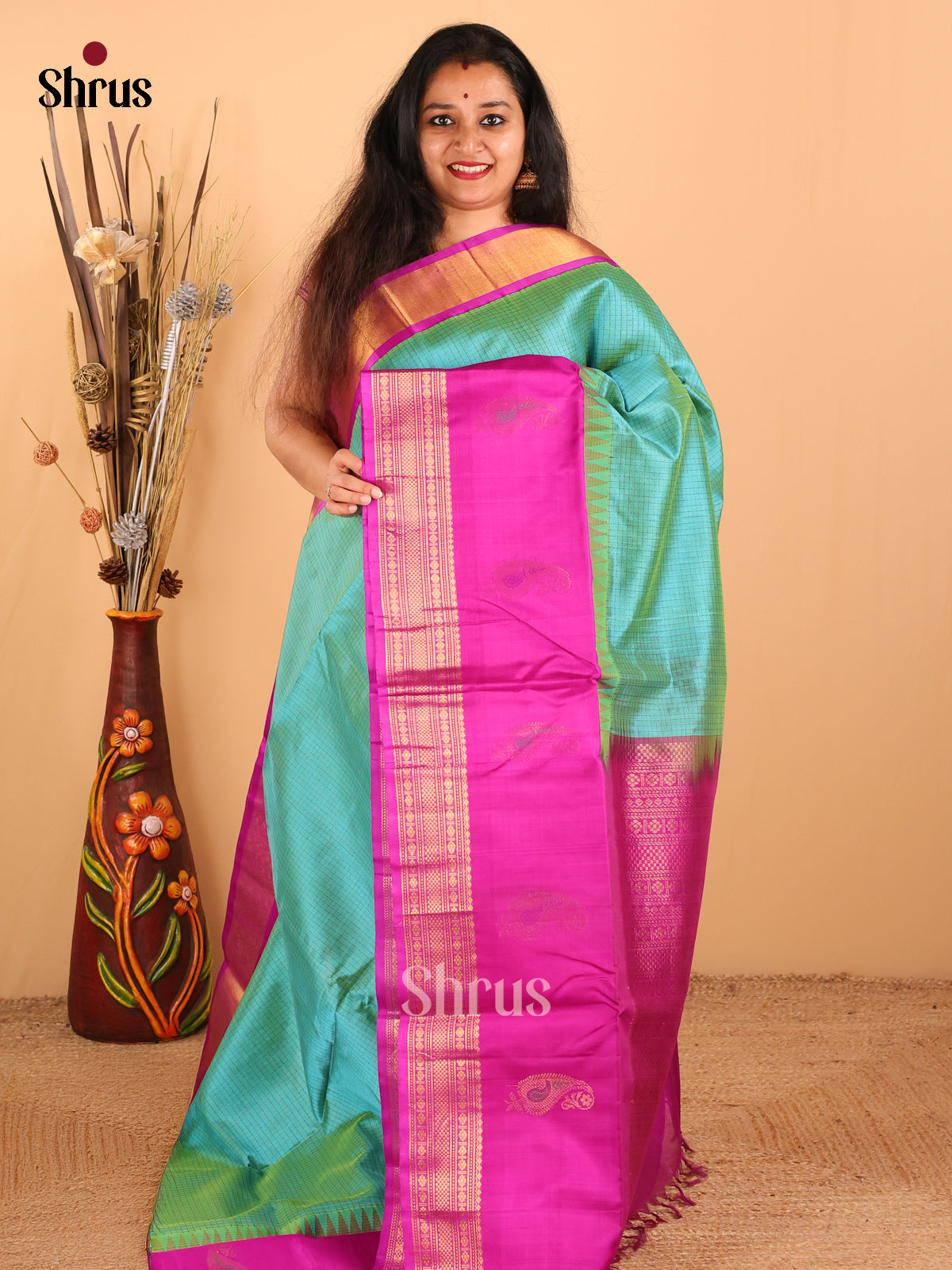 Glorious Teal Green And Purple Silk Cotton Saree With Intricately Woven Checks Across The Body And Manga Motifs in The Border - Shop on Shrus.com