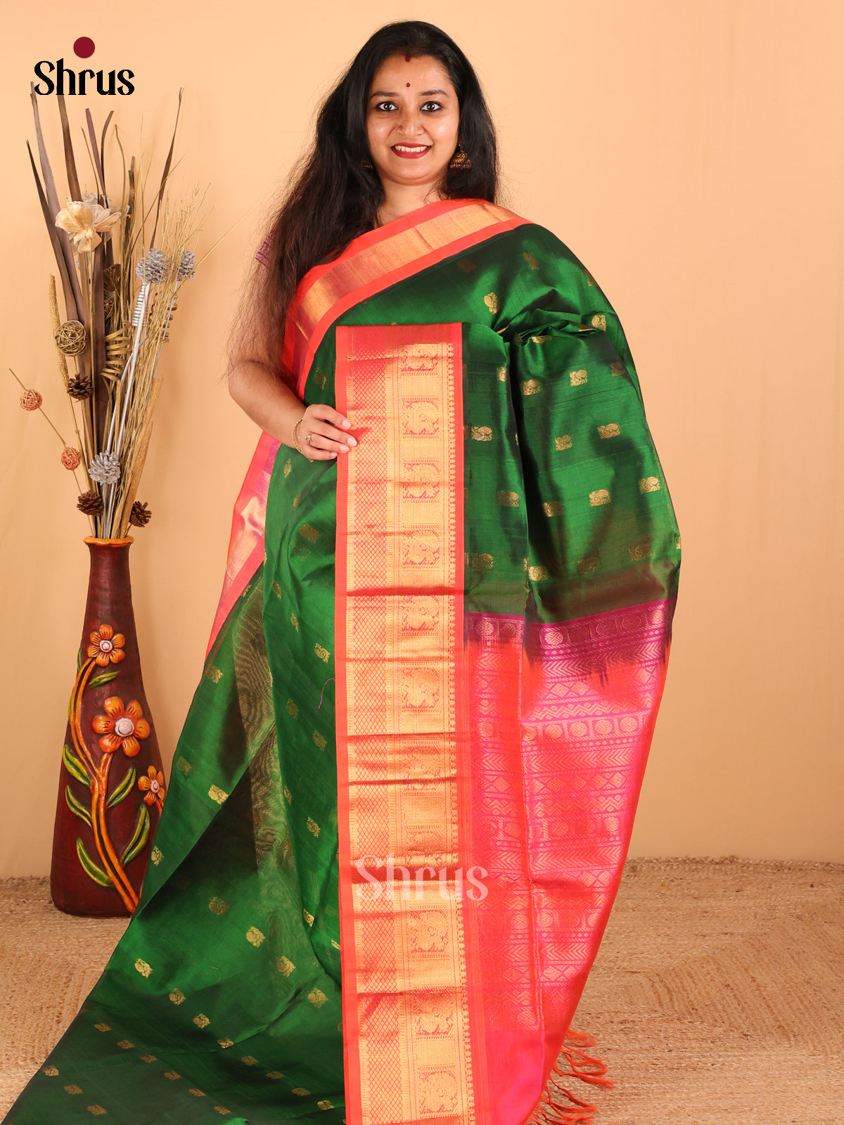 Serene Dark Green And Orangish pink Silk Cotton Saree With Zari Woven Peacock Buttas - Shop on Shrus.com