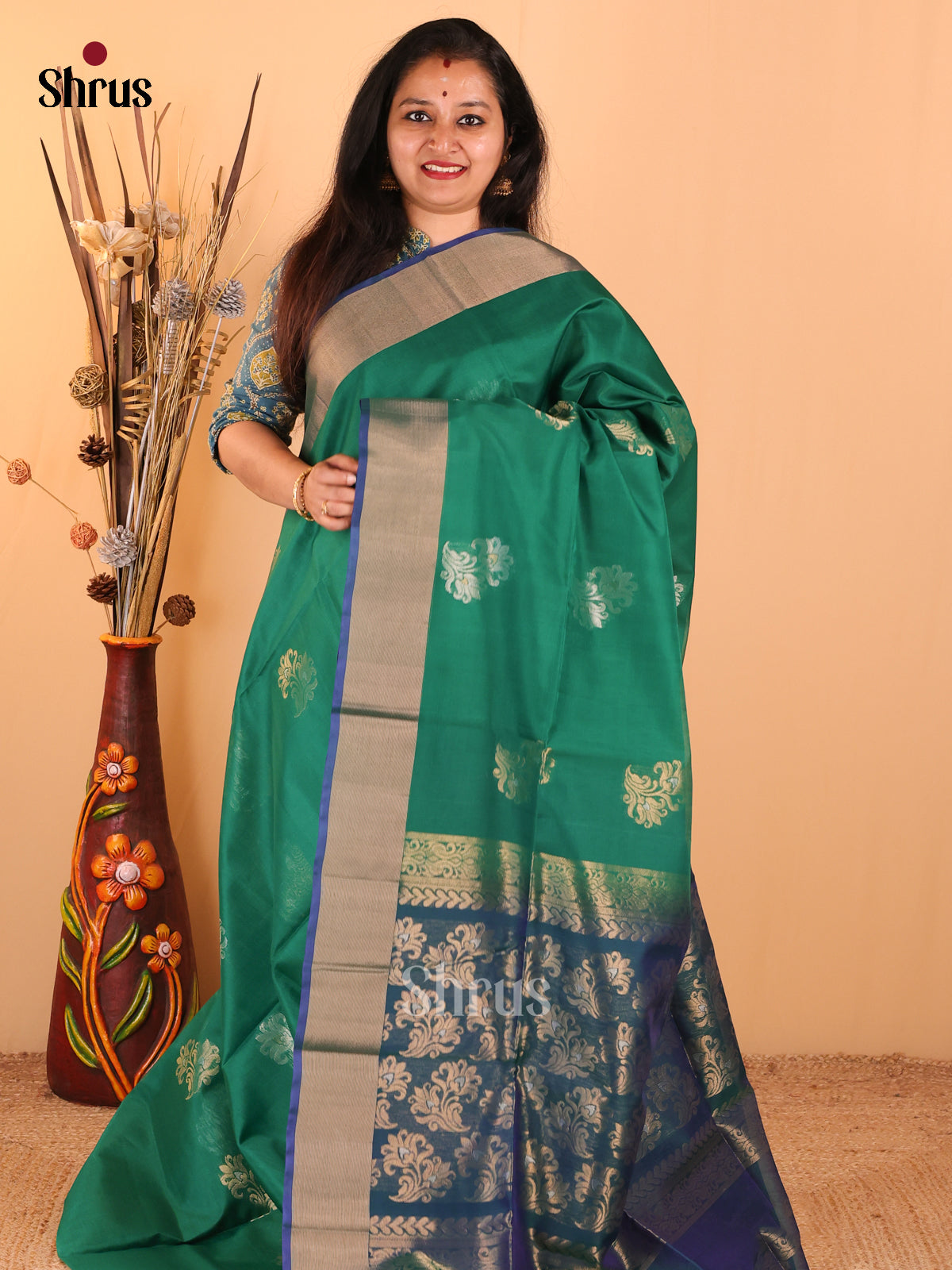 Captivating Green Silk Cotton Saree With Silver & Gold Motifs & Blue Zari Border & Pallu - Shop on Shrus.com