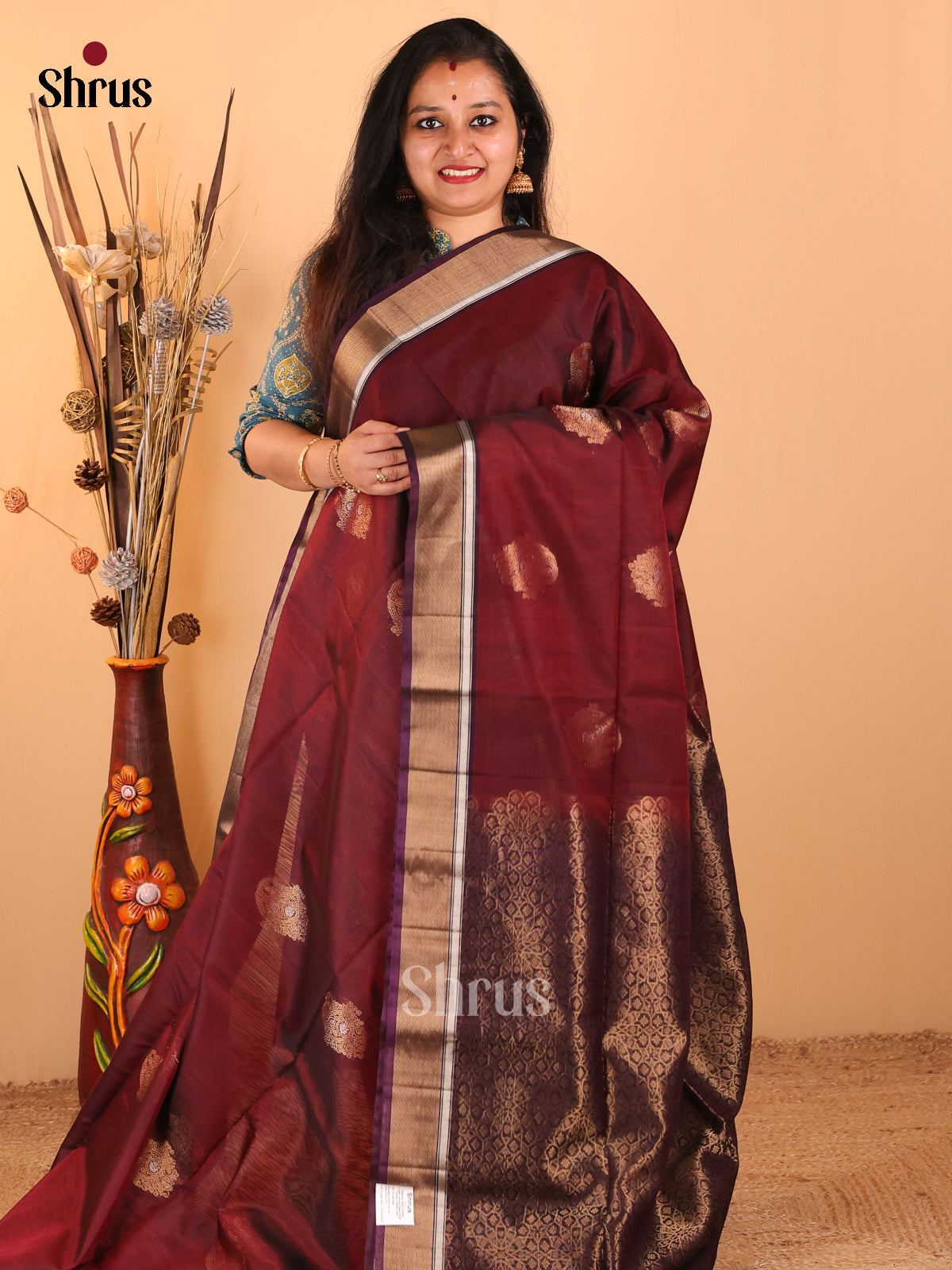 Maroon Silk Cotton Saree With Paisley silver And Gold zari buttas Across The Body Adorned With Golden Zari Woven Border And Pallu - Shop on Shrus.com