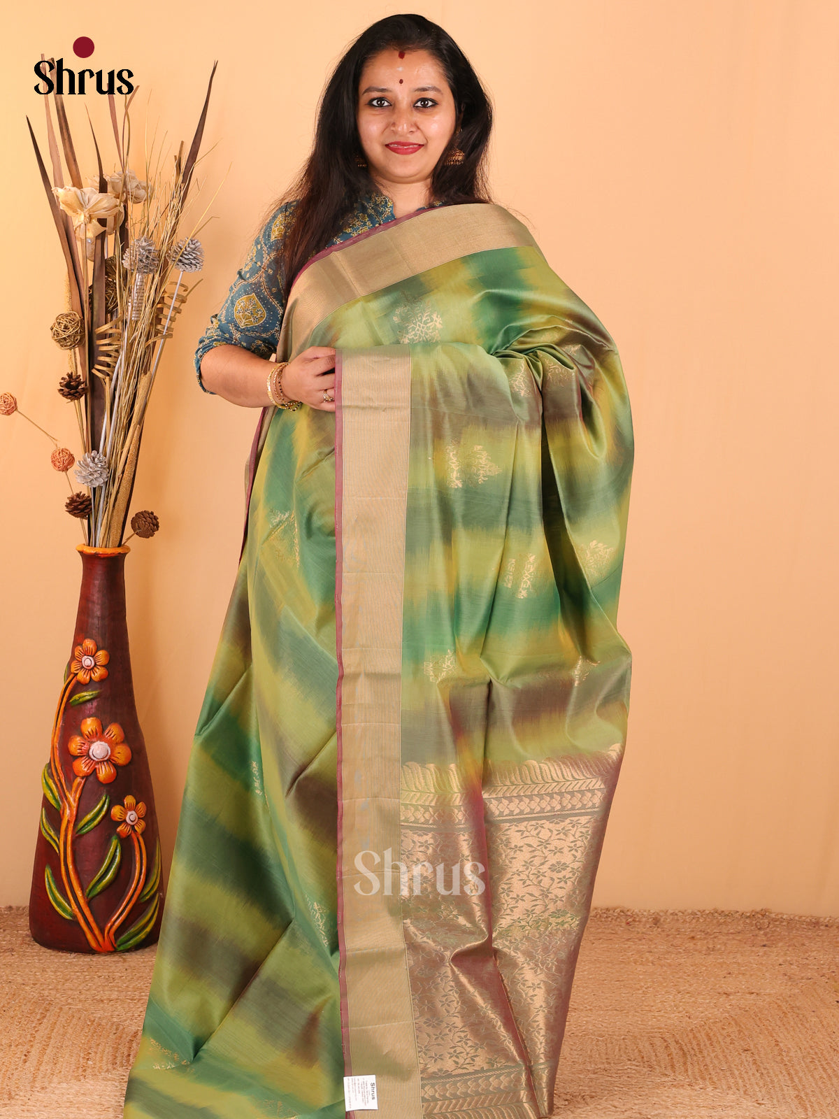 Silk Cotton Saree With Rich Hues Of Green Featuring Zari Motifs, Golden Border & Pallu - Shop on Shrus.com
