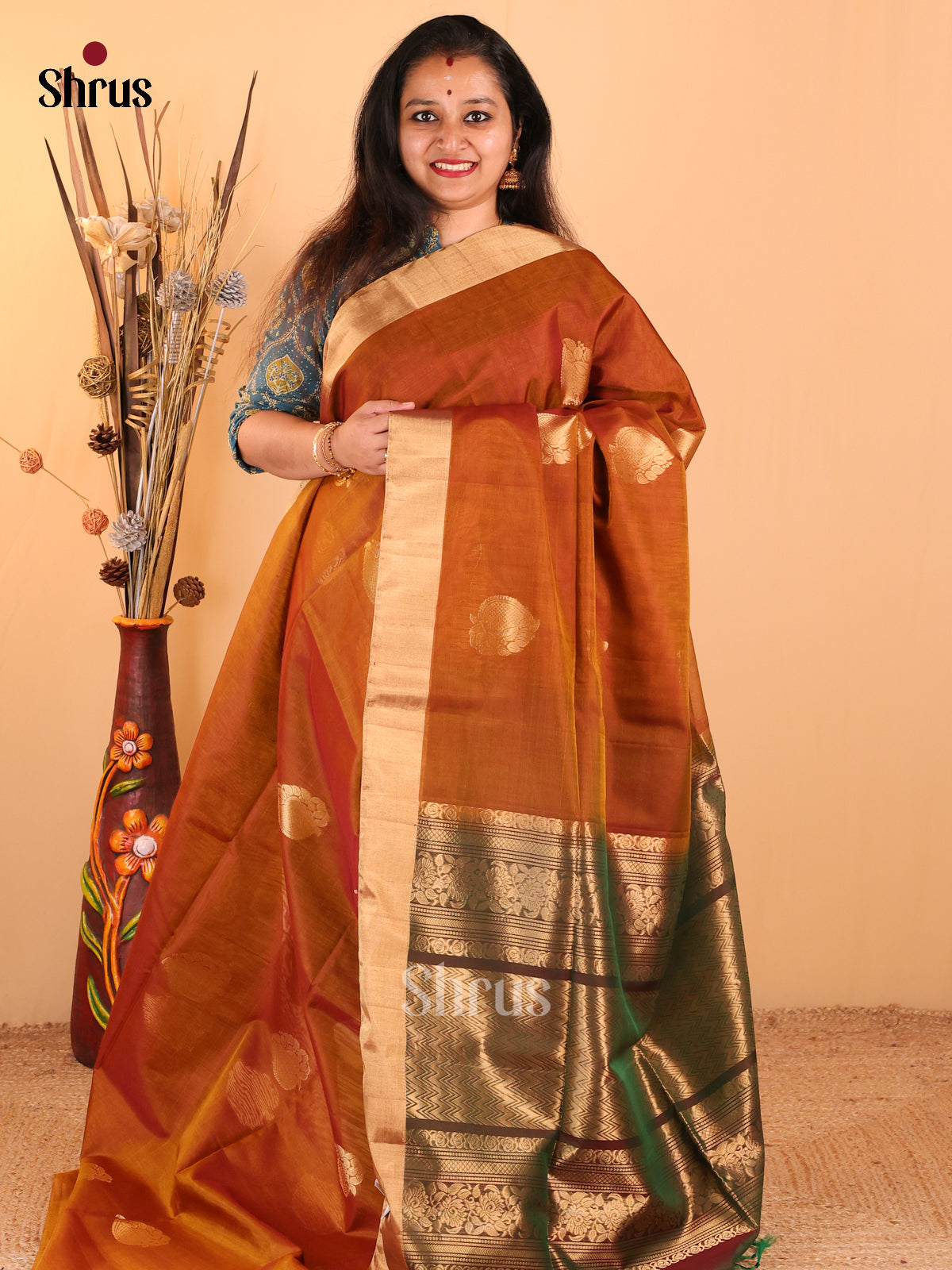 Pretty Brown Silk Cotton Saree With Floral Motifs And Zari Woven Border & Green Pallu - Shop on Shrus.com