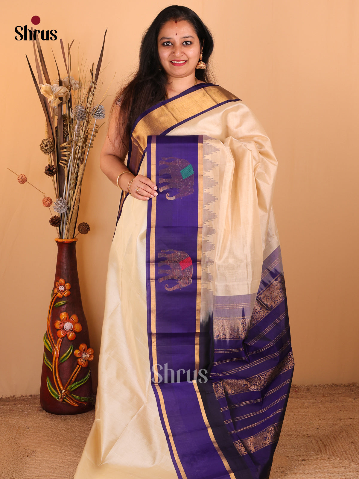 Pretty Cream Silk Cotton Saree With Blue Rettapet Zari Border With Elephant Motifs - Shop on Shrus.com