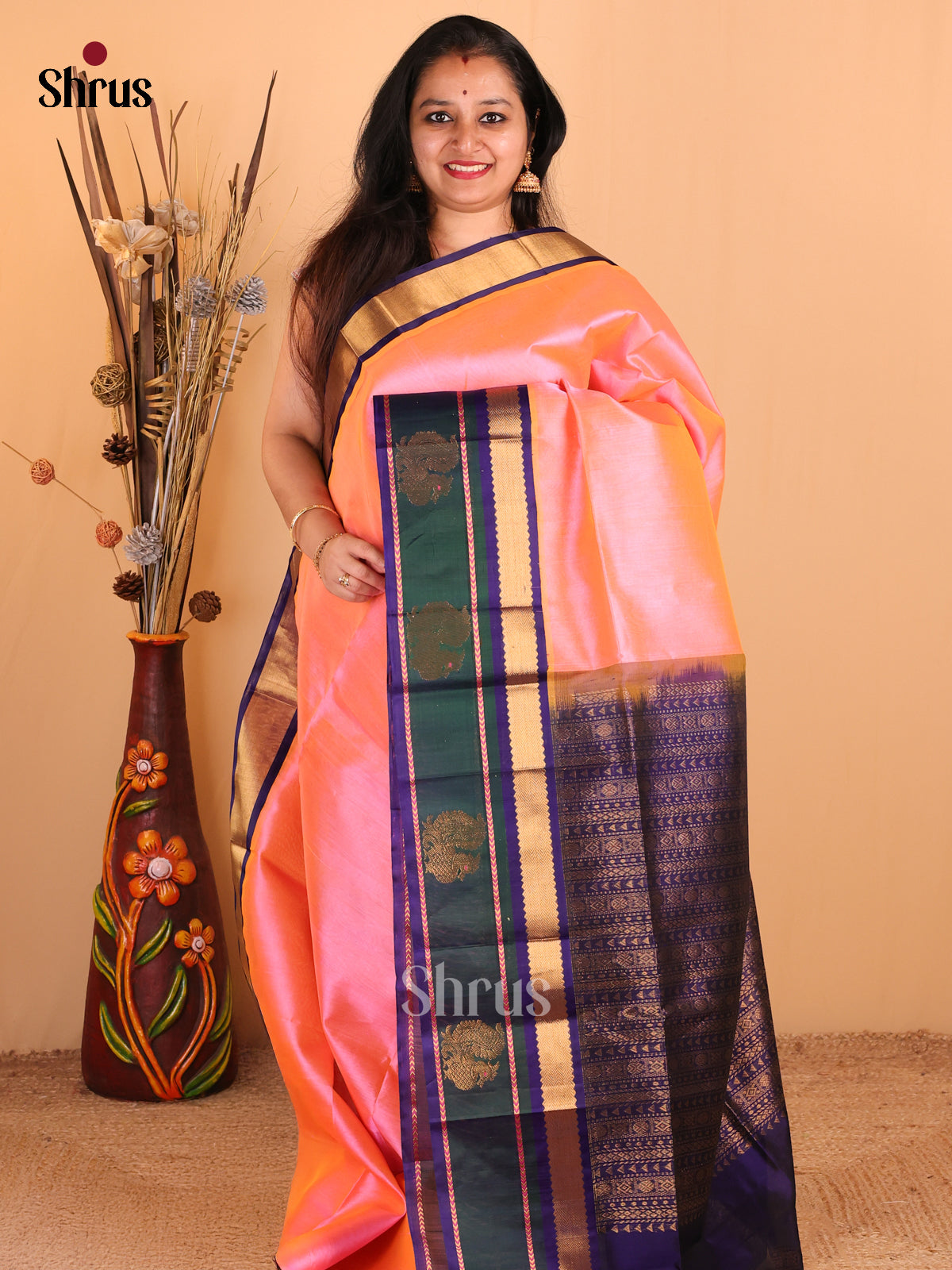 Charming Peachish Pink Silk Cotton Saree with Blue Border & Peacock Motifs - Shop on Shrus.com