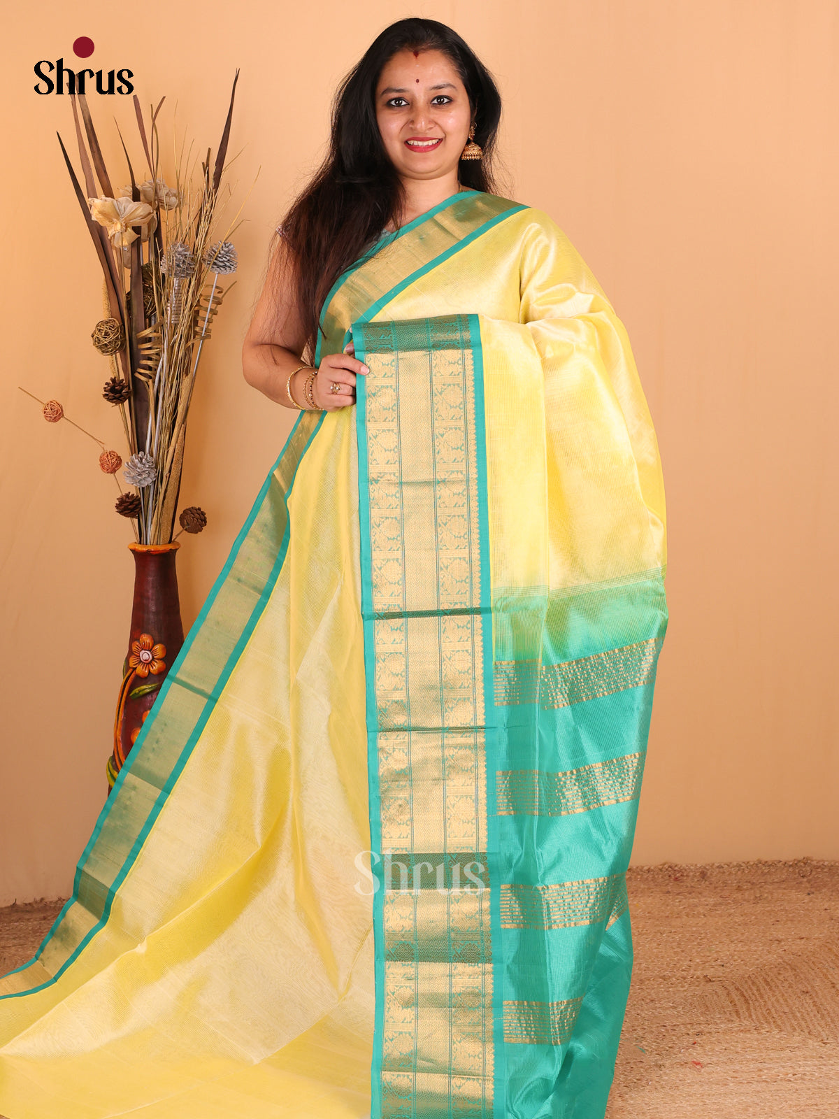 Luminous Light Yellow Silk Cotton Saree with Striking Teal Korvai Border & Zari Pallu - Shop on Shrus.com