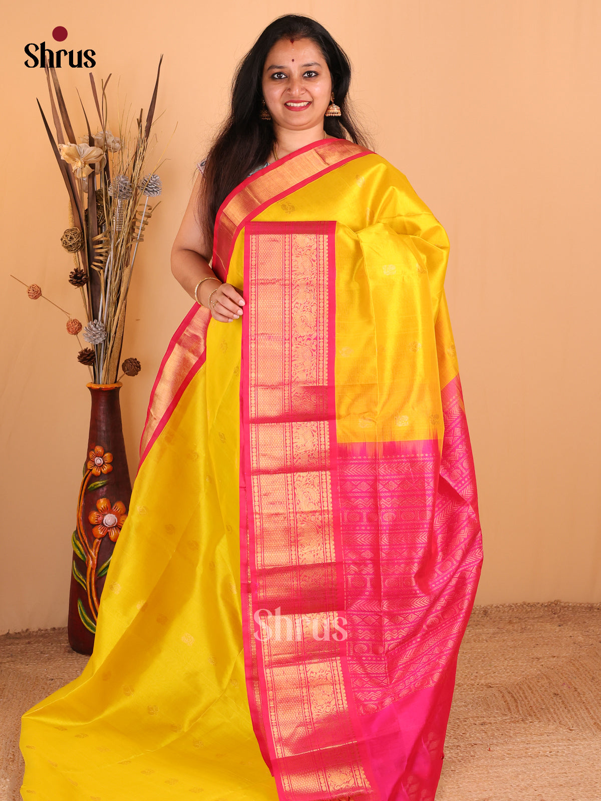 Radiant Yellow Silk Cotton Saree with Zari Peacocks Paired With Pink Border & Zari Pallu - Shop on Shrus.com