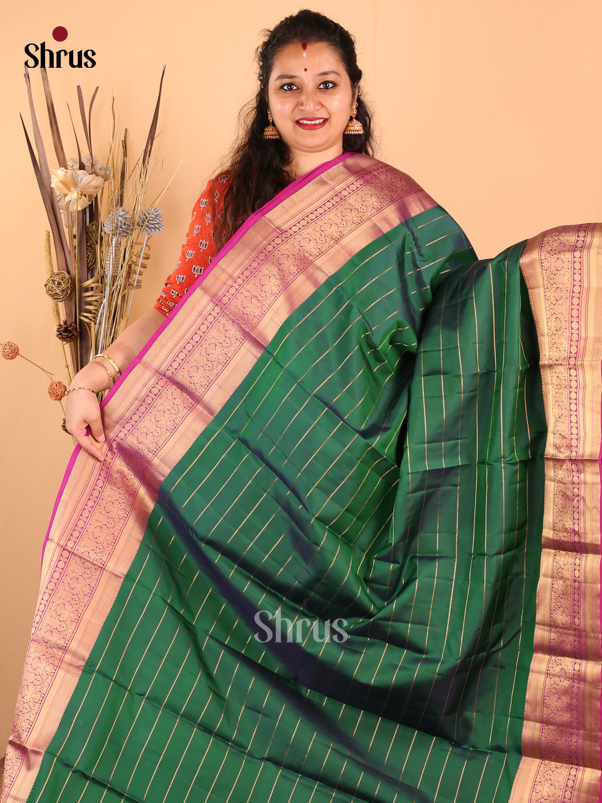 Classy Bottle Green Kanchipuram silk Saree with zari stripes, floral vine border - Shop on Shrus.com