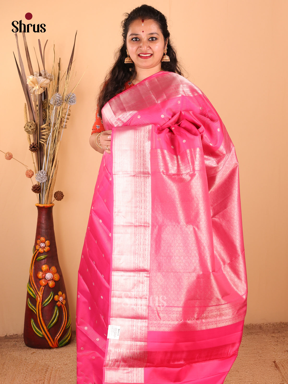 Graceful Pink Monochrome Kanchipuram silk Saree zari buttas & floral pallu - Shop on Shrus.com