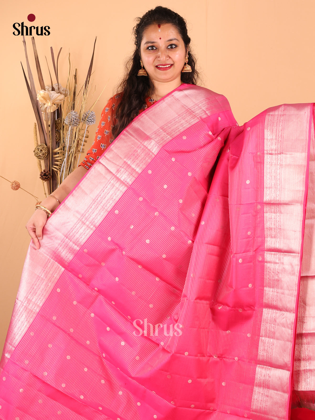 Graceful Pink Monochrome Kanchipuram silk Saree zari buttas & floral pallu - Shop on Shrus.com