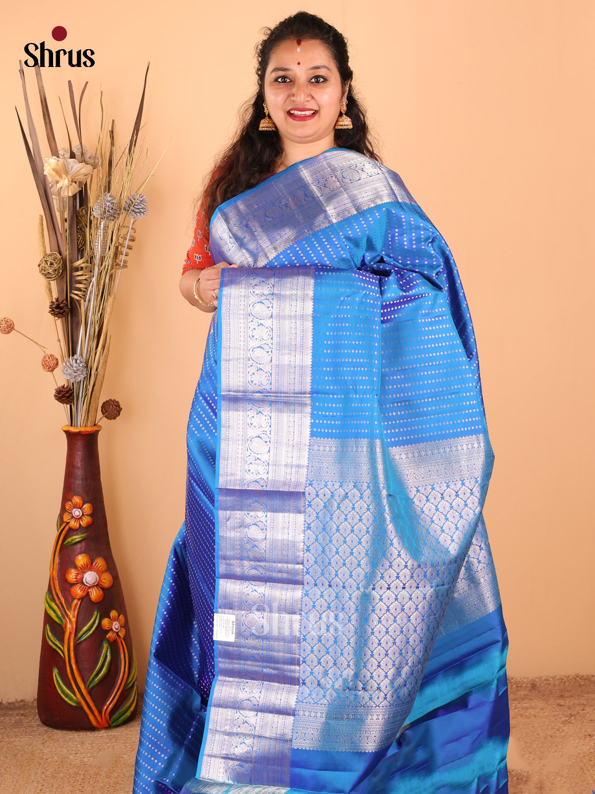 Chic Blue monochrome Kanchipuram silk Saree with zari buttas , floral vines border - Shop on Shrus.com