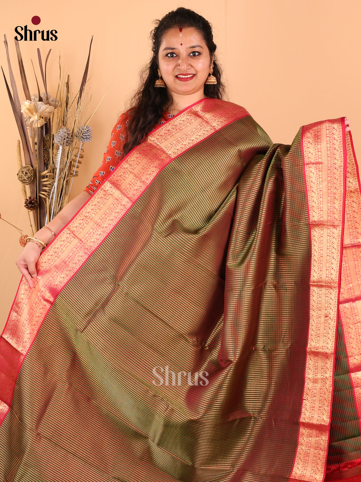 Beautiful Chutney Green Kanchipuram silk Saree with zari checks & floral pallu - Shop on Shrus.com