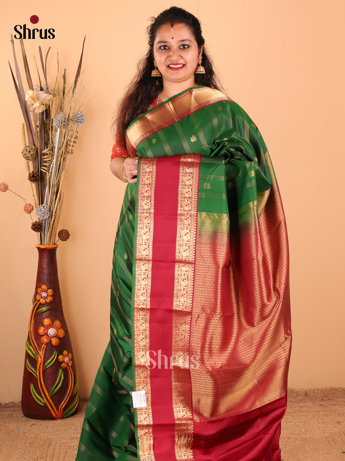 Ethereal Green Kanchipuram silk Saree with zari stripes, buttas & Rettaipet zari border - Shop on Shrus.com