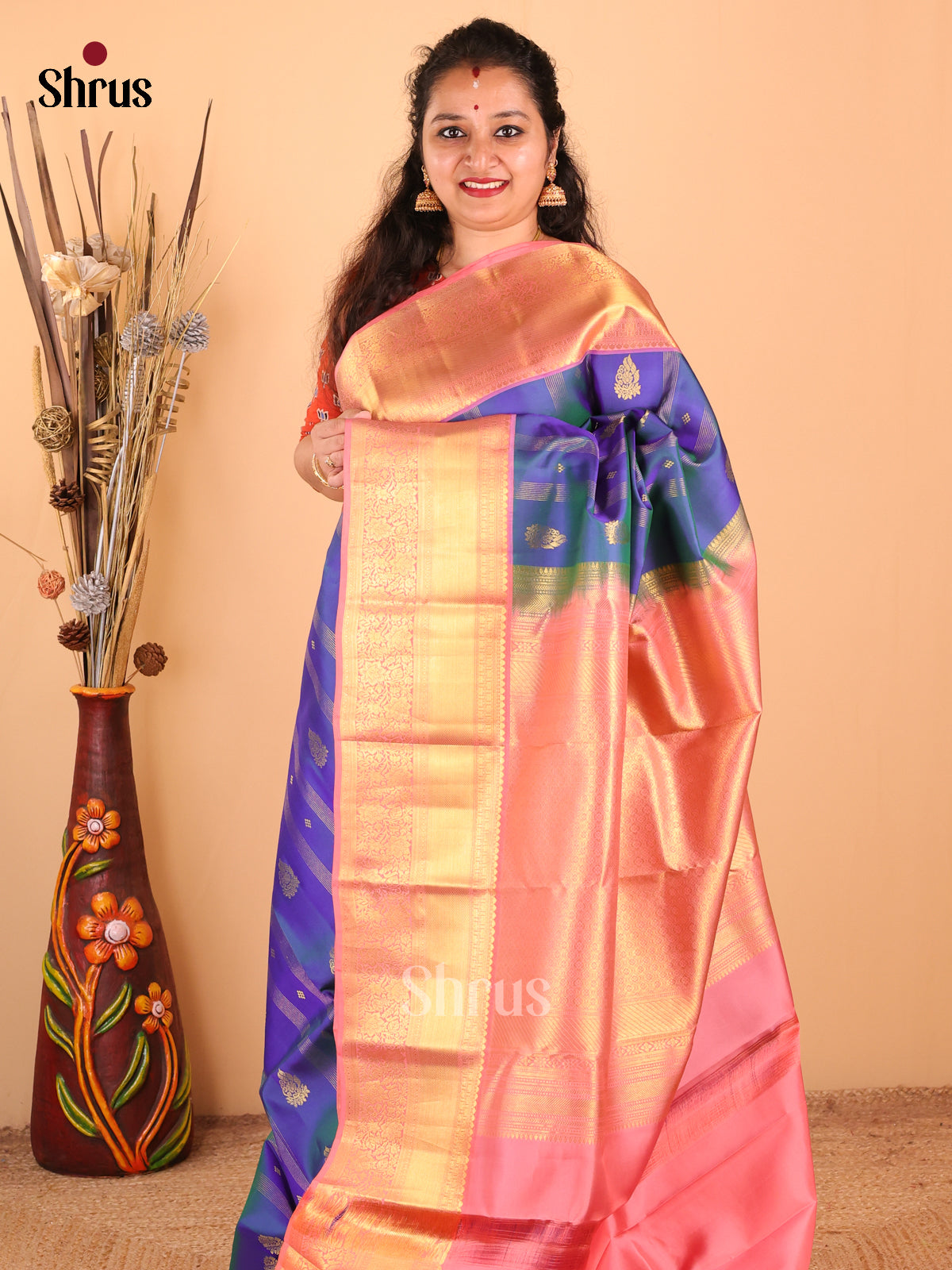 Vibrant Double Shaded Blue Kanchipuram silk Saree with zari stripes & floral buttas - Shop on Shrus.com