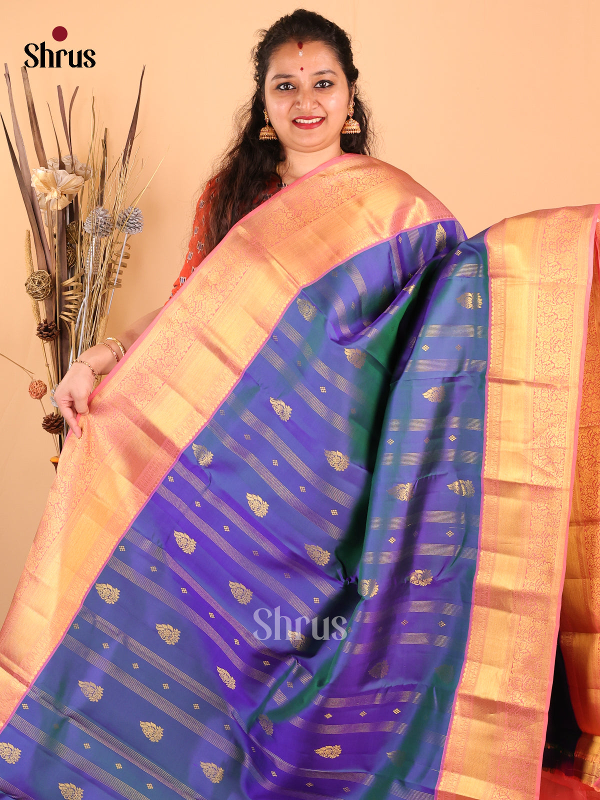 Vibrant Double Shaded Blue Kanchipuram silk Saree with zari stripes & floral buttas - Shop on Shrus.com