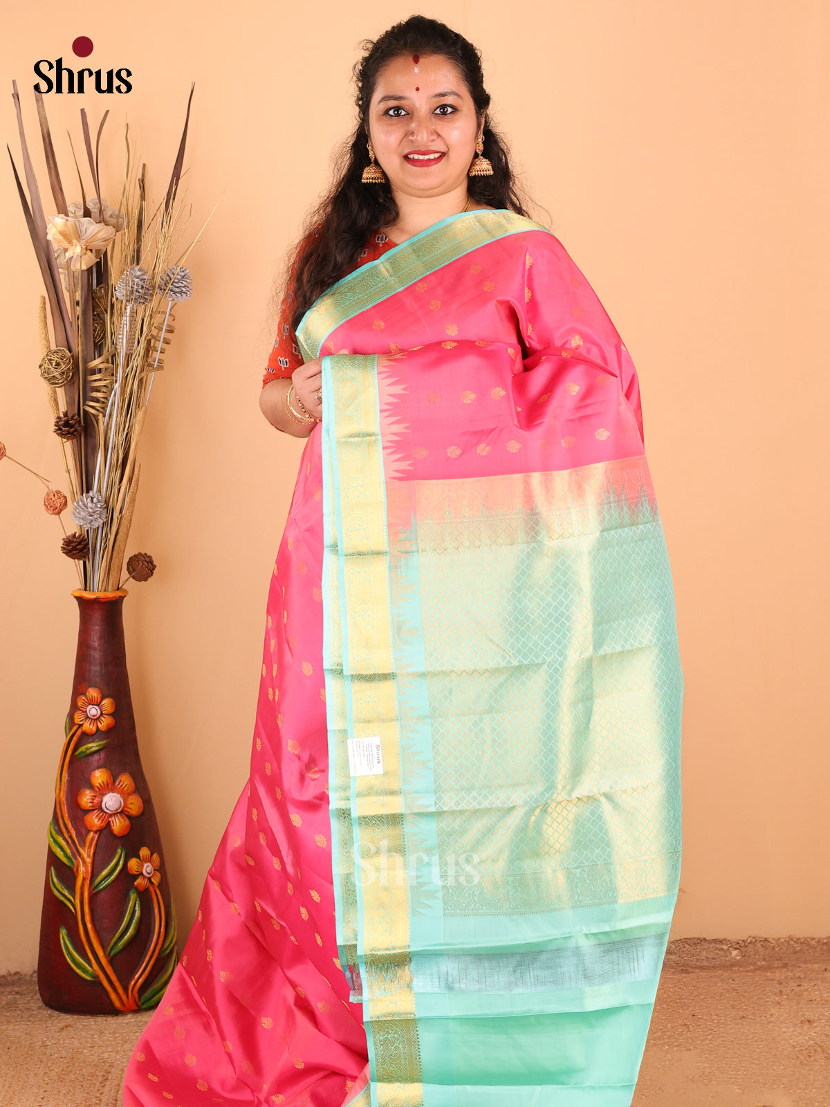 Dazzling Pink Kanchipuram silk Saree with zari woven thousand buttas, peacock vines border-1