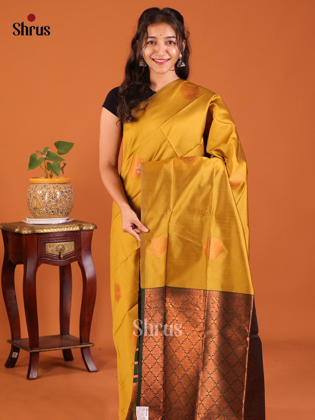 Mustardy Green Semisoft silk Saree with zari woven paisleys motifs , contrast Green floral buttas brocade - Shop on Shrus.com