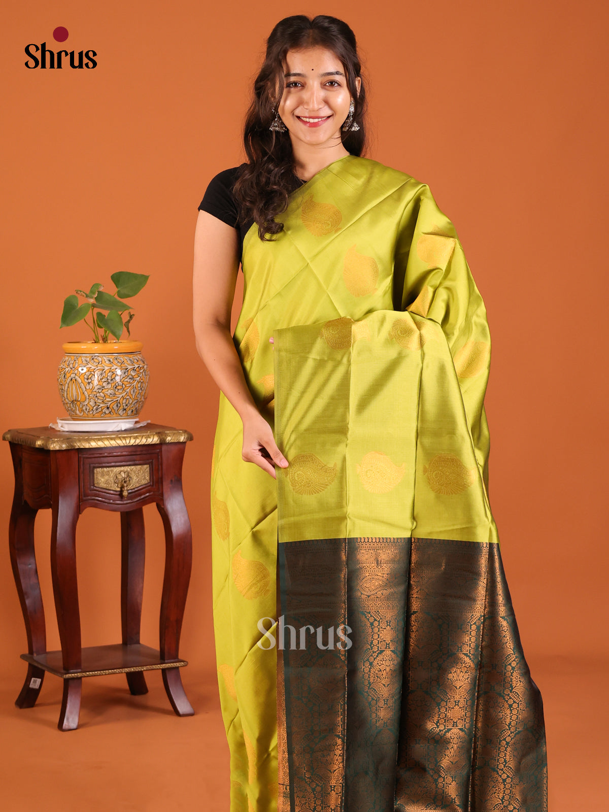 Enchanting Lite Green Semisoft silk Saree with gold zari paisleys motifs , Green floral nestling brocade pallu - Shop on Shrus.com
