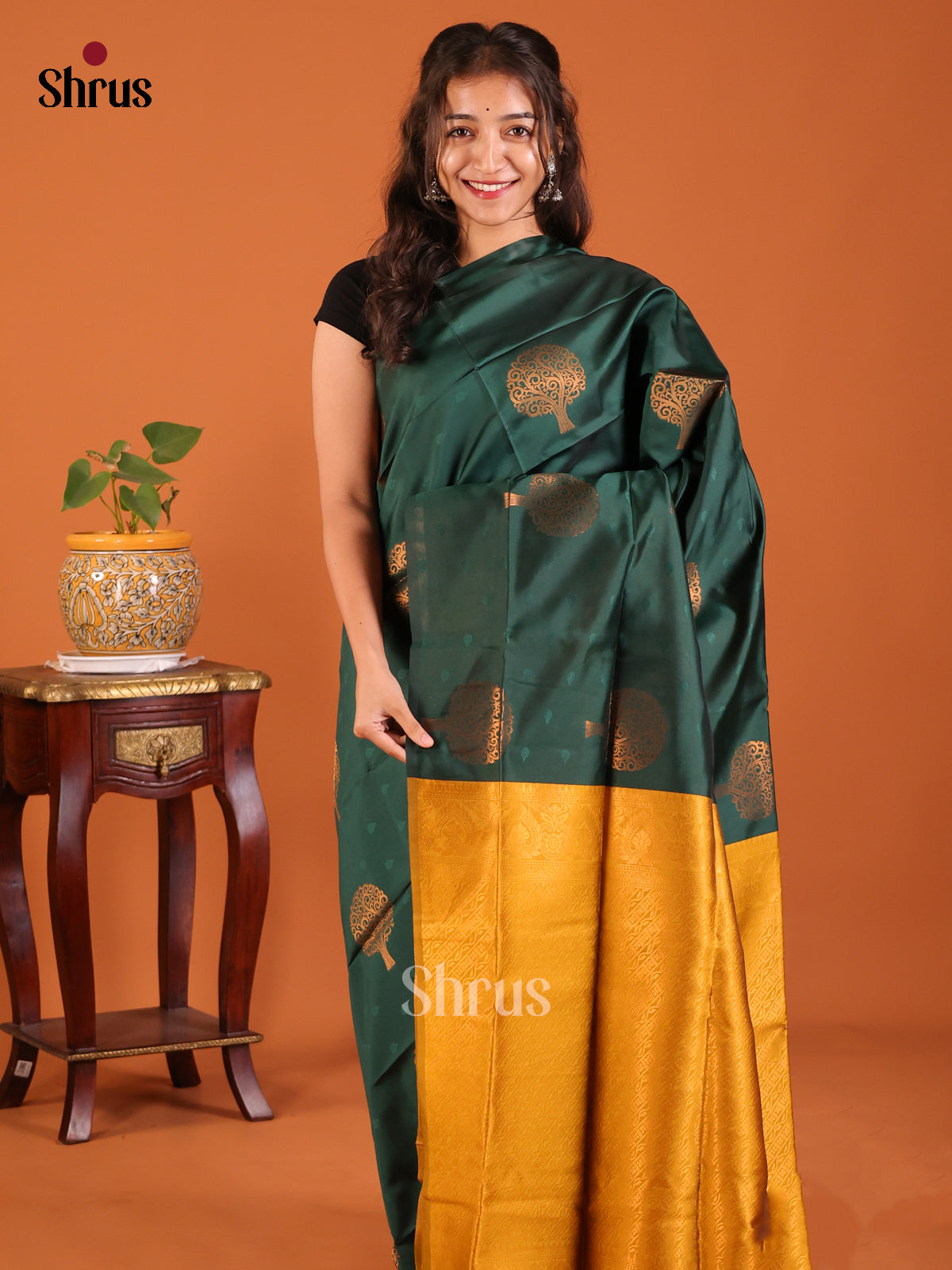 Stunning Dark Green Semisoft silk Saree with jacquard buttas , zari woven tree motifs - Shop on Shrus.com