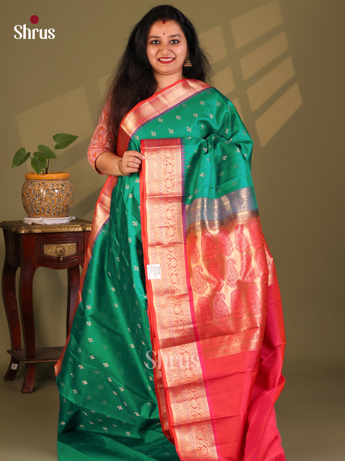 Classy Green Kanchipuram Silk Saree with gold zari buttas & paisleys brocade pallu-1
