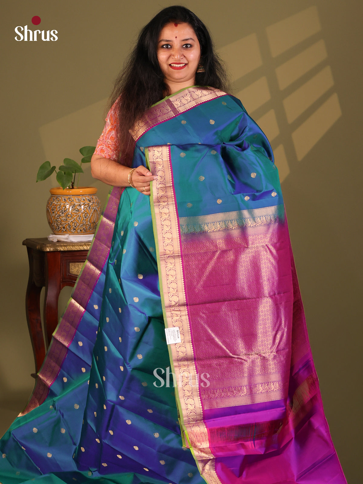 Lovely Peacock Blue Kanchipuram Silk Saree with zari buttas & floral vines border - Shop on Shrus.com