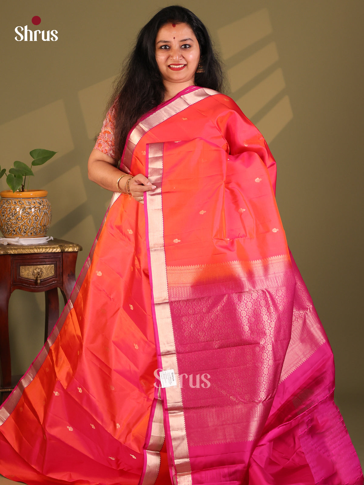 Radiant Orange Kanchipuram Silk Saree with floral brocade pallu-1