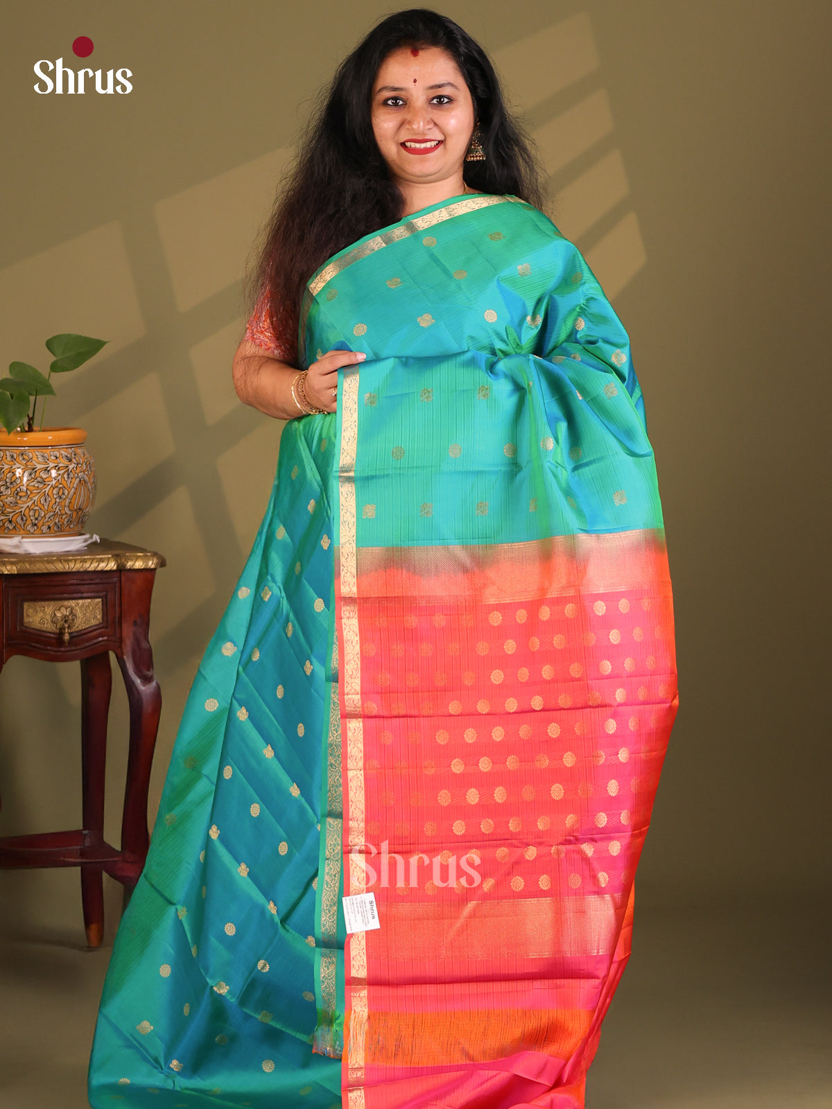 Classy Green with Orangish Pink Kanchipuram Silk Saree with zari Buttas - Shop on Shrus.com