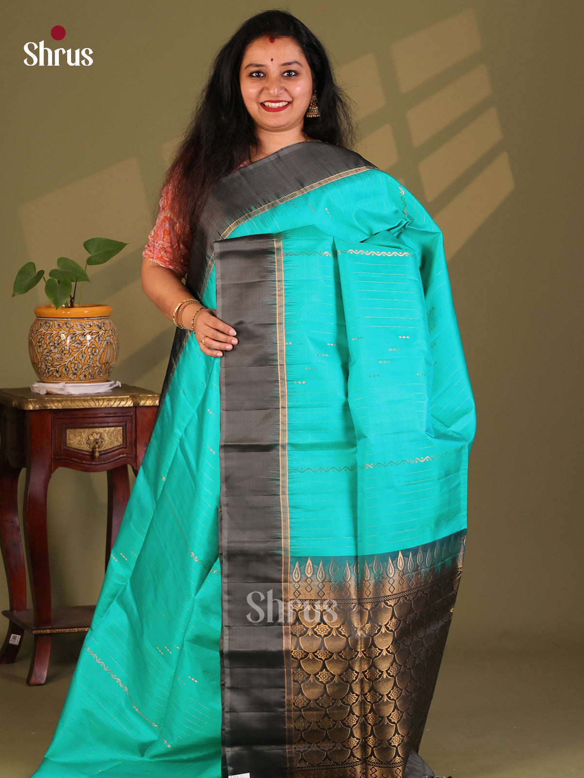 Exquisite Teal Soft Silk Saree zari stripes buttas , contrast black floral pallu - Shop on Shrus.com