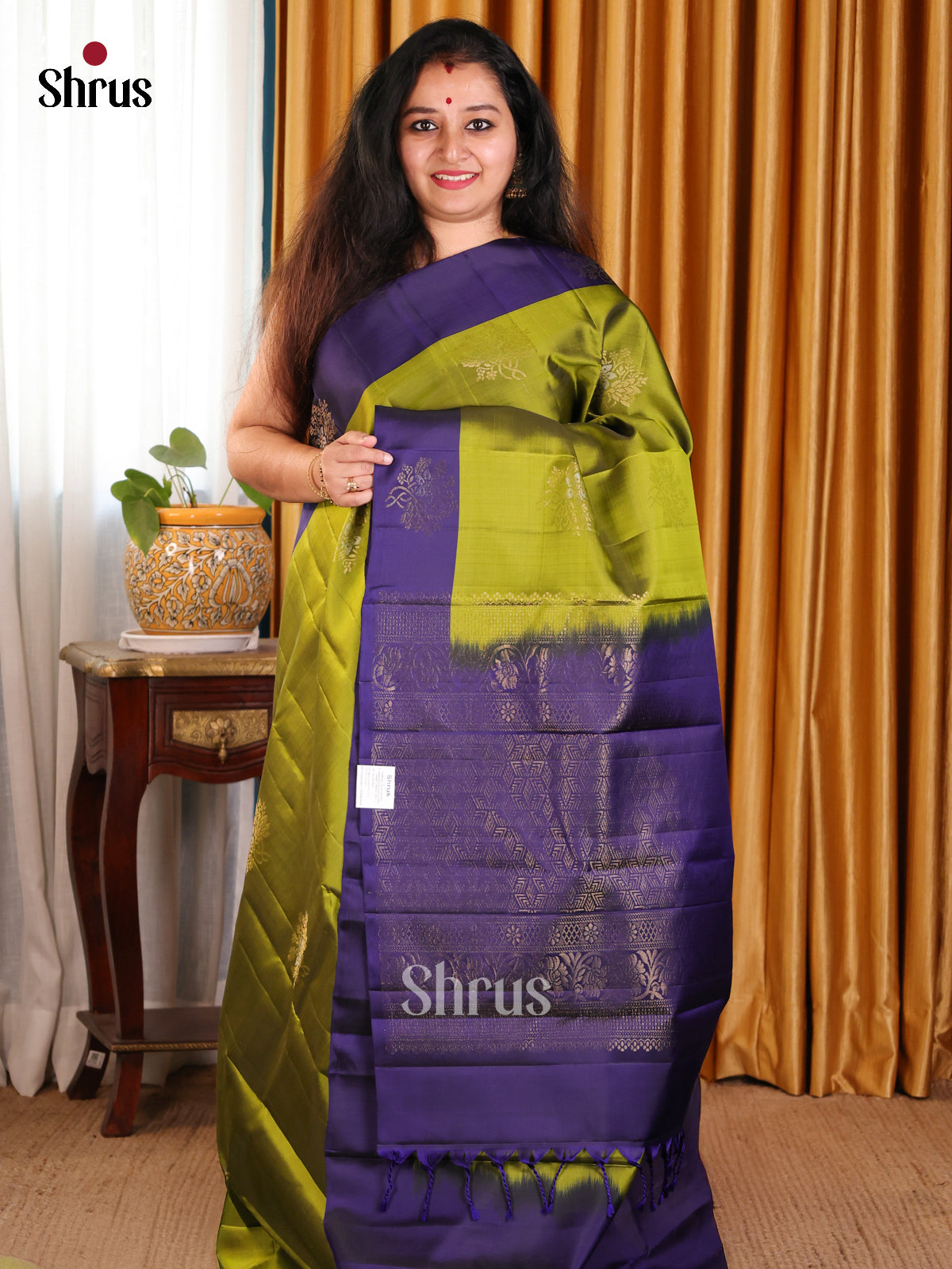 Sleek Green Softsilk-halfpure Saree with gold, silver zari floral motifs - Shop on Shrus.com